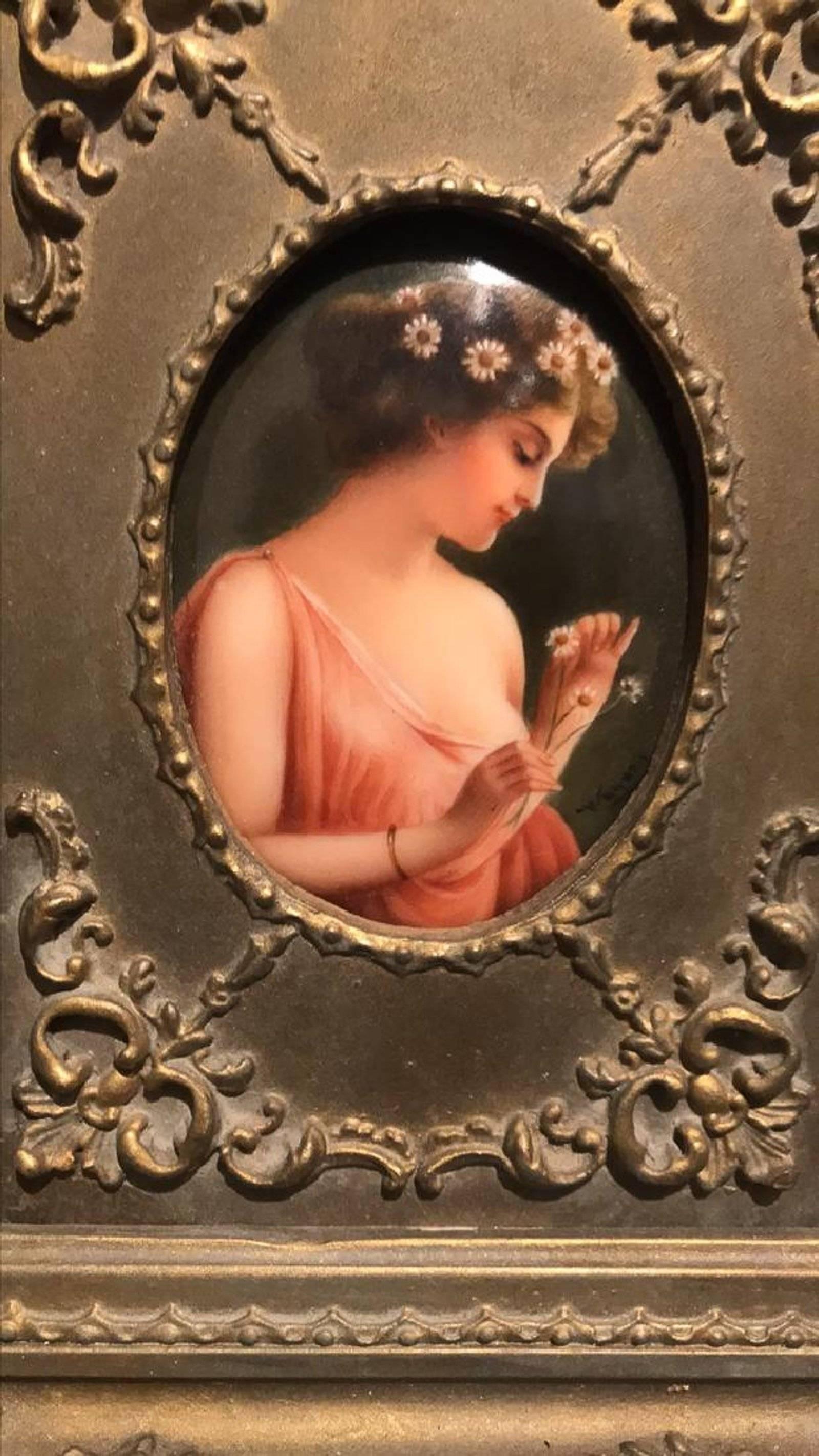 Exquisite antique German hand-painted porcelain portrait plaque of superior detail depicting a young beauty with daisies, signed Wagner and titled on verso 