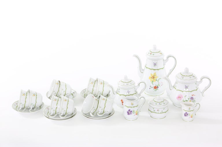 German porcelain tea / coffee service for ten people. Each piece is in great condition. Maker's mark undersigned 