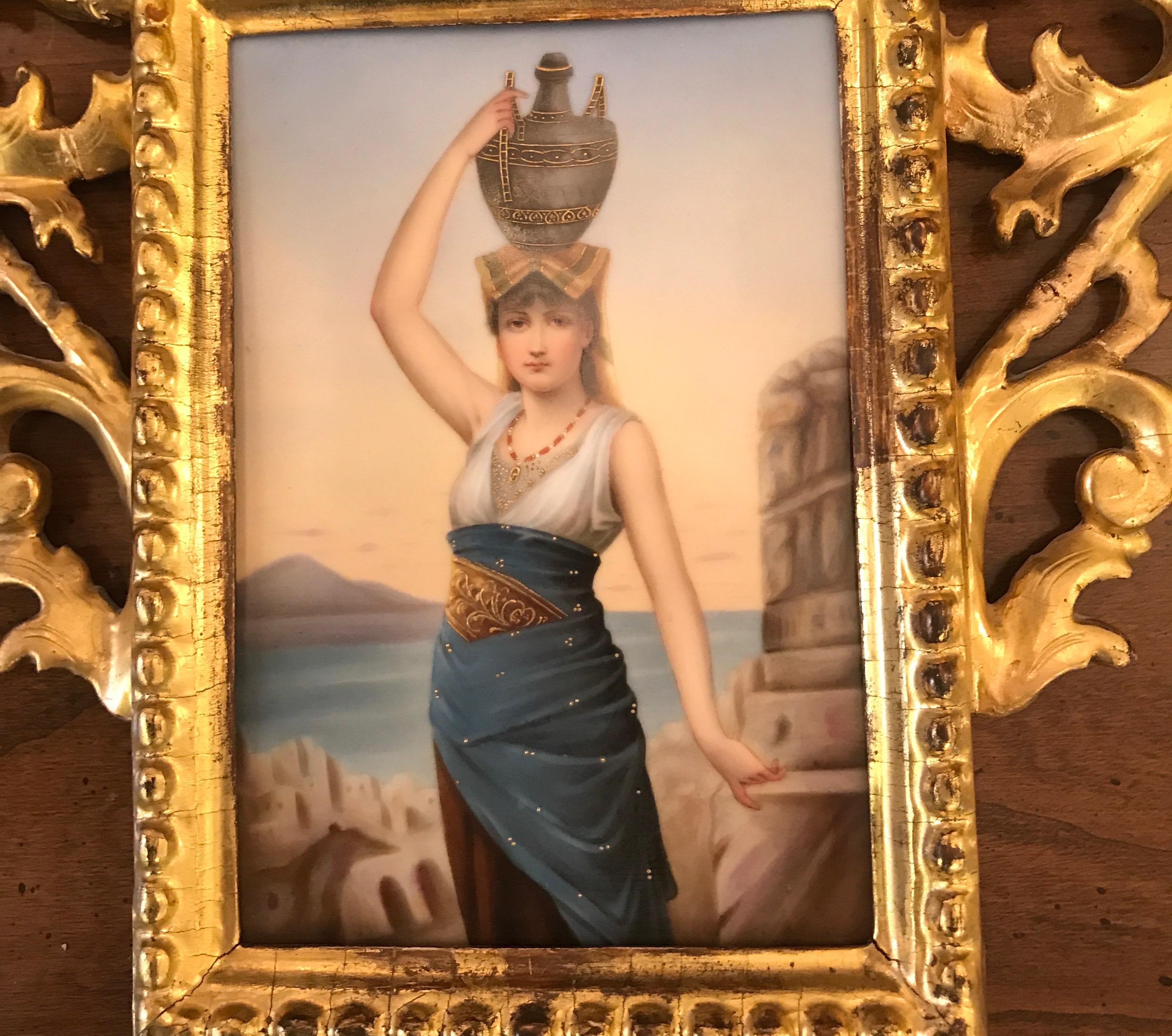 The plaque depicting a woman in orientalist-style dress after The Pompeiian by Nathaniel Sichel (German, 1843-1907) the giltwood Italian frame measures 12 high, 10 wide, the plaque measuring 6 high, 4.25 wide. The stunning detail on the hand painted