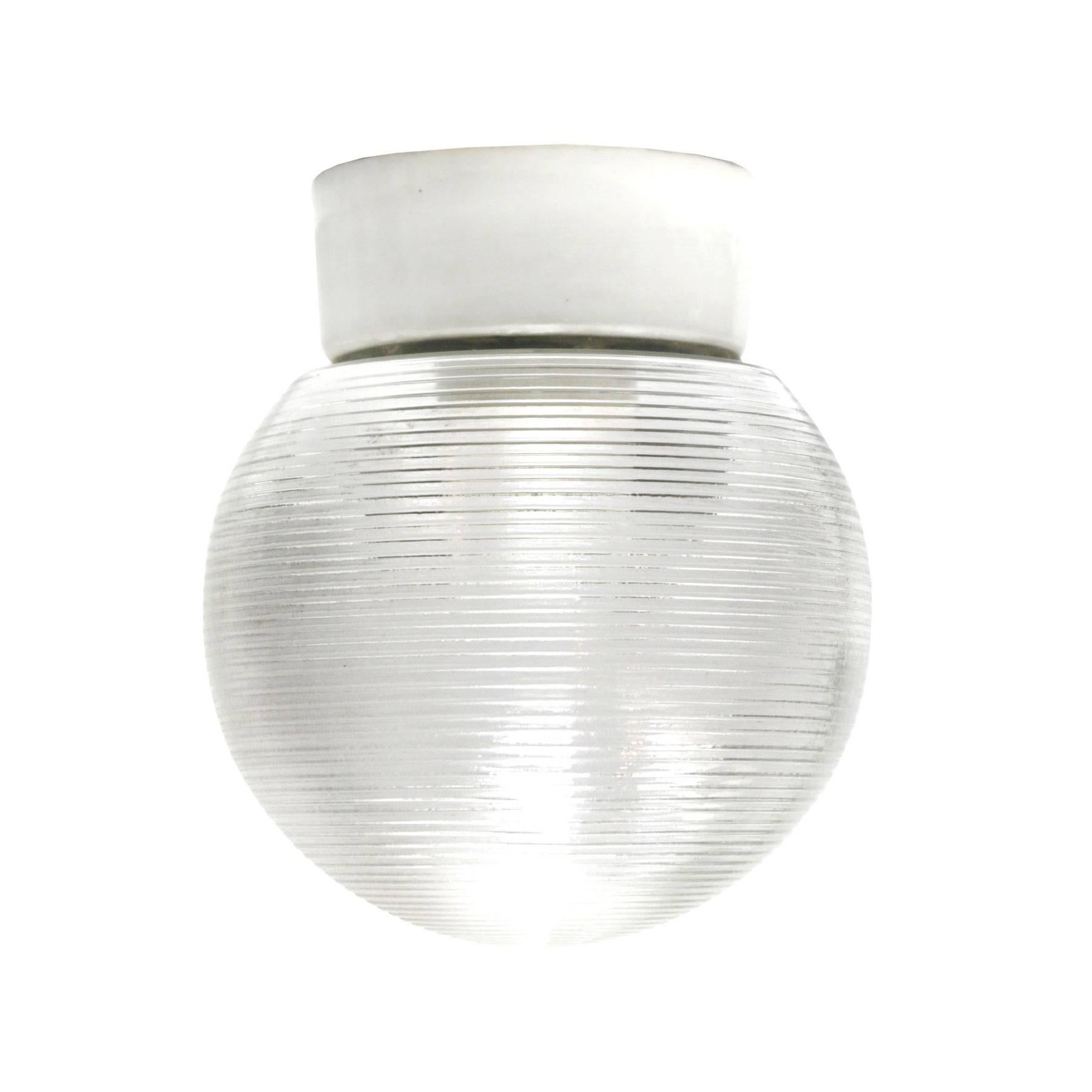 Industrial ceiling lamp. White porcelain. Striped glass.
Two conductors. No ground.

Weight: 0.9 kg / 2 lb

Priced per individual item. All lamps have been made suitable by international standards for incandescent light bulbs, energy-efficient and