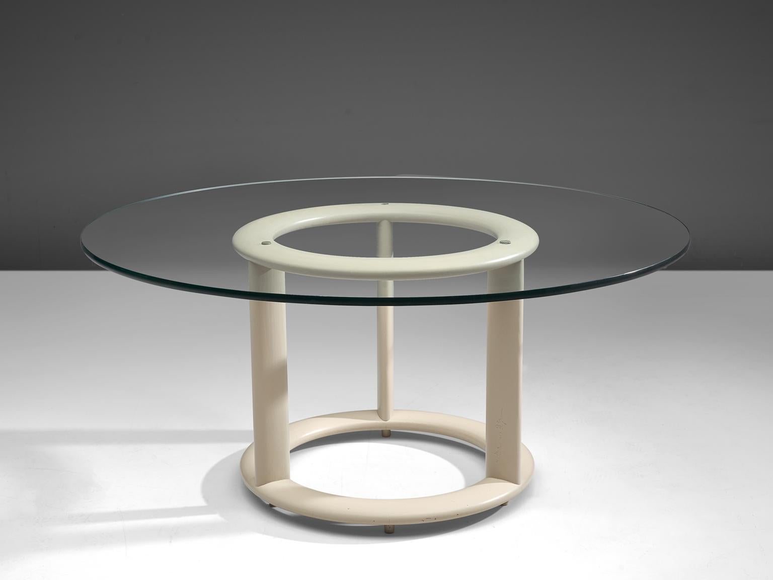 Rosenthal Studio Linie, dining table, glass and painted wood, Germany, 1970s

This postmodern centre table with white lacquered circular foot features a round glass top. The model is very minimalistic, featuring a base with only the necessary