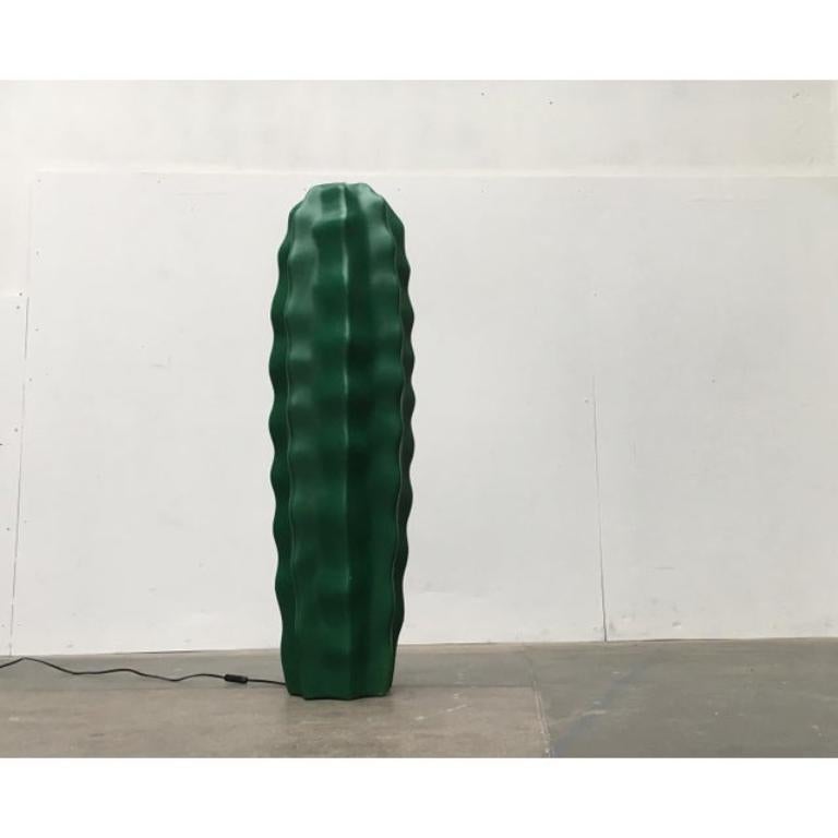 Cactus floor lamp from Flötotto in a special version. The large sucu in green is very rare to find.

The stylized cactus shape gives a decorative yet understated lighting object. The lamp is made of plastic and is very sturdy. Inside there is a