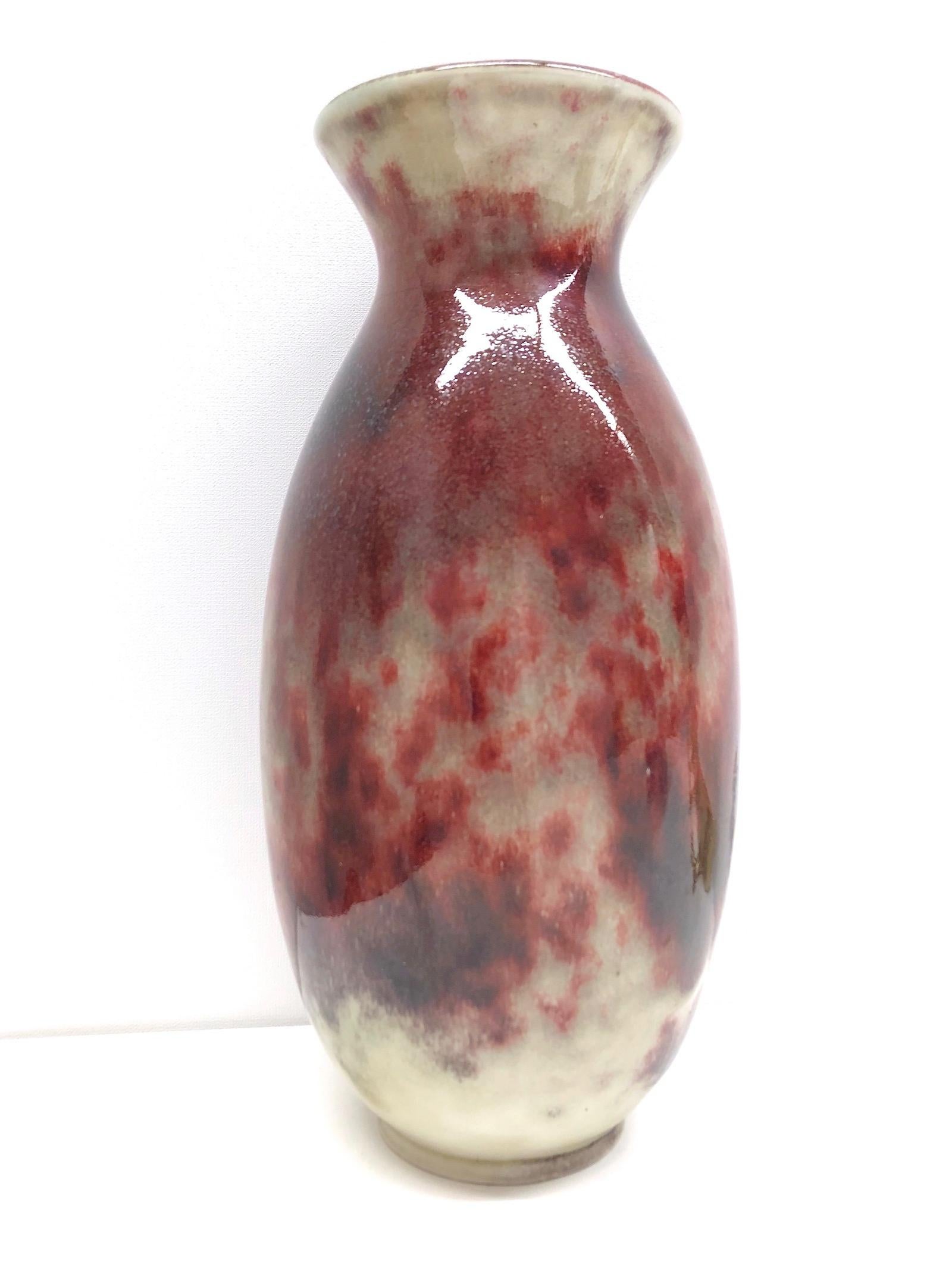 An amazing glazed magnificent pottery vases by noted German manufacturer WMF. With a rich 