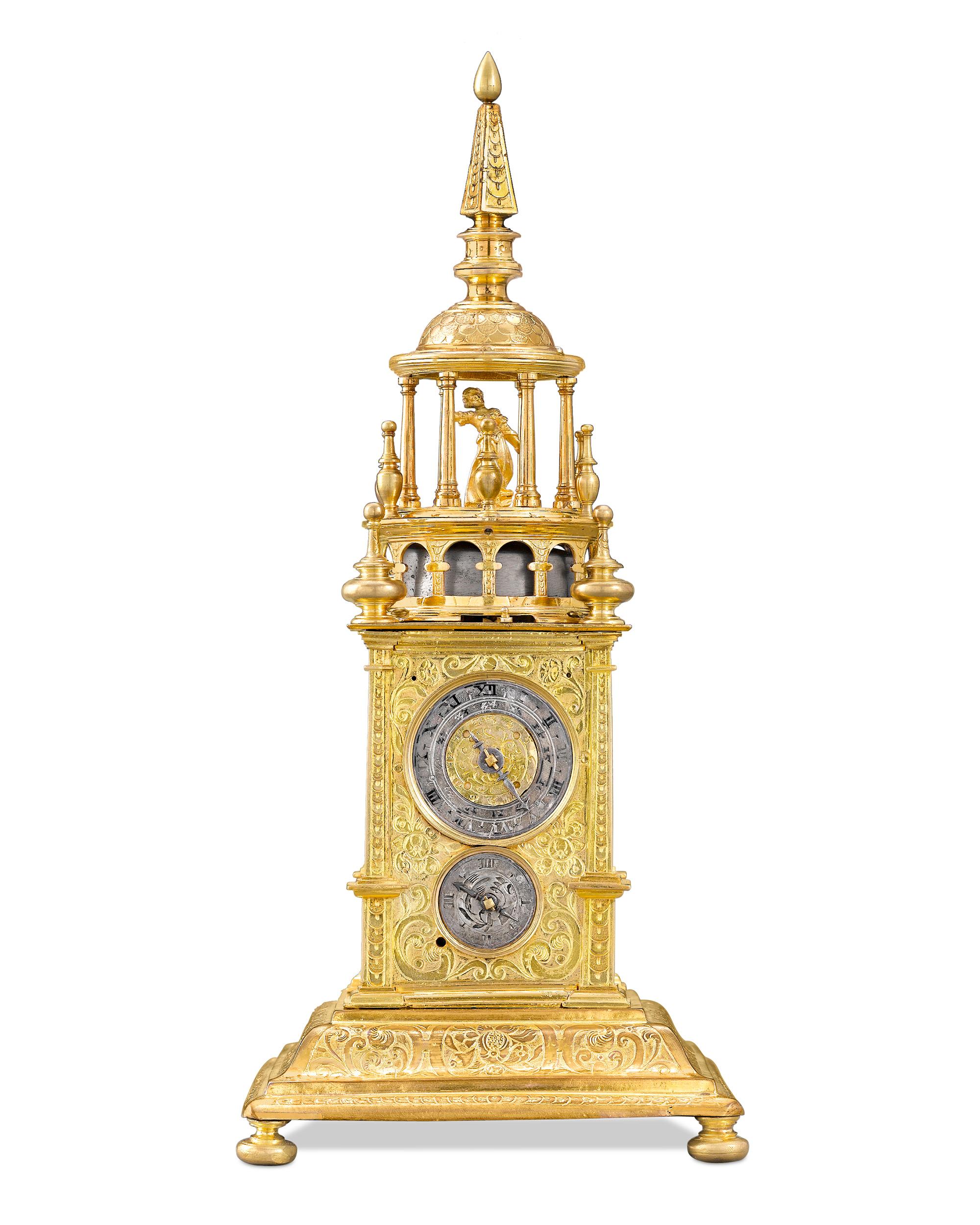 This immensely rare Renaissance turret-form clock, or the table clock, was considered both a scientific marvel and an item of luxury during the period. This incredible piece is encased in fire gilt brass crafted to resemble the giant striking clocks