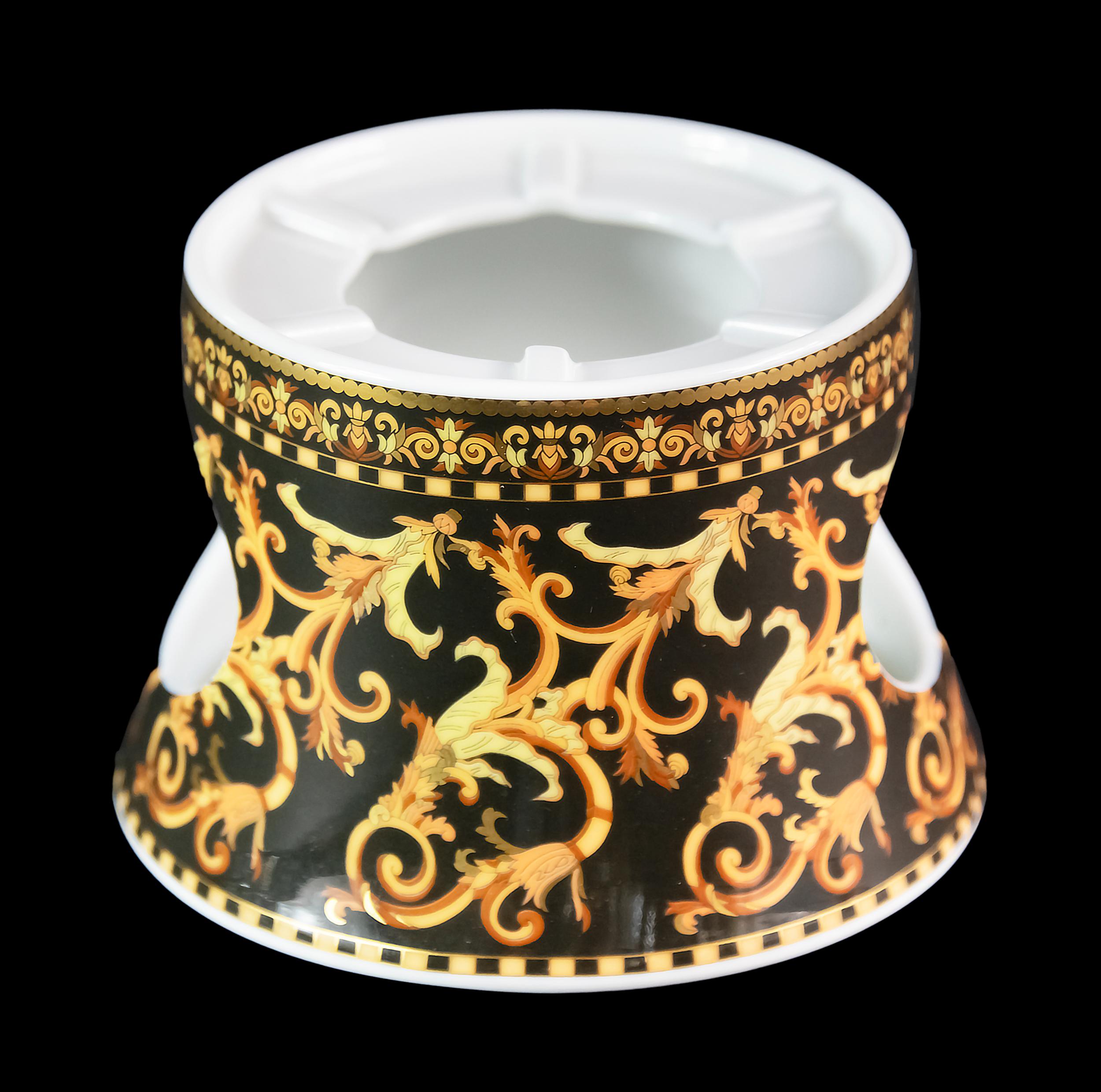 Calentador de porcelana alemán Rosenthal para cafetera.
Model No: Versace Barocco.
Estampado en la parte inferior.


