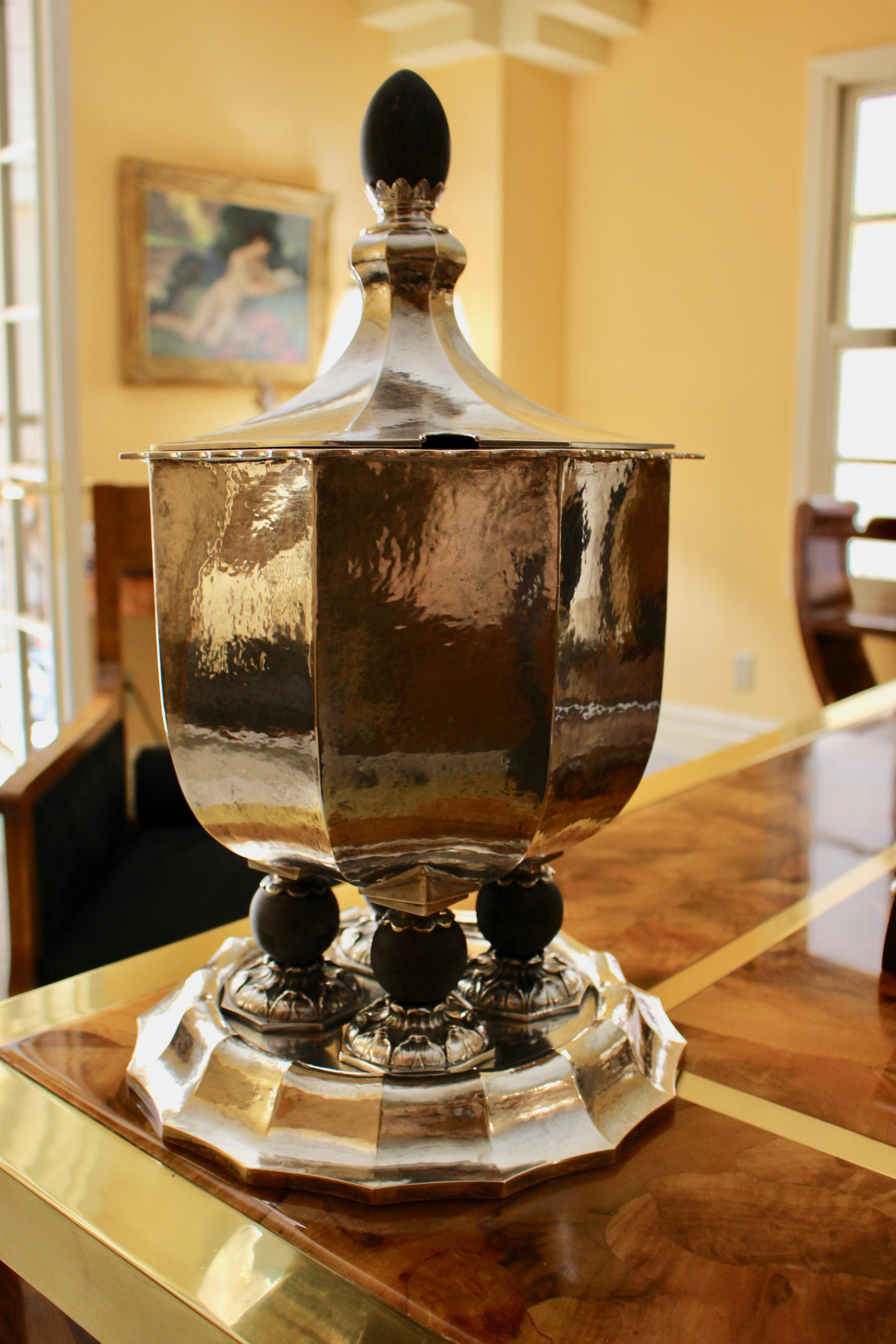 A German Secessionist silver tureen and cover. This deep octagonal bowl is raised on a shaped circular base, circa 1925.