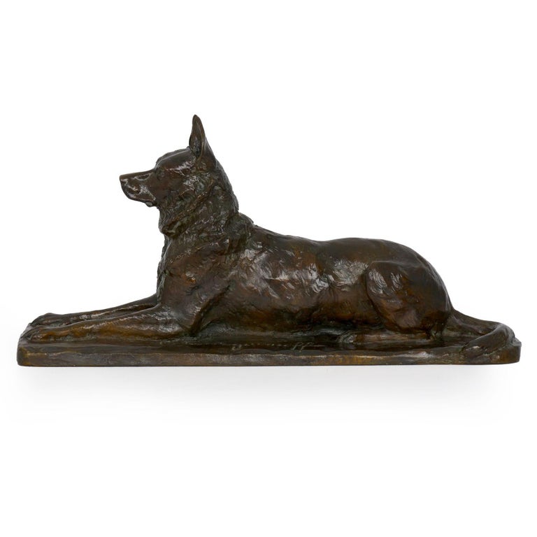 An exquisite lost-wax model of a resting German shepherd cast by the Susse brothers foundry, the cast is technically very precise, likely a relatively early casting in light of the fine surface detail preserved in the mold throughout. It is a very