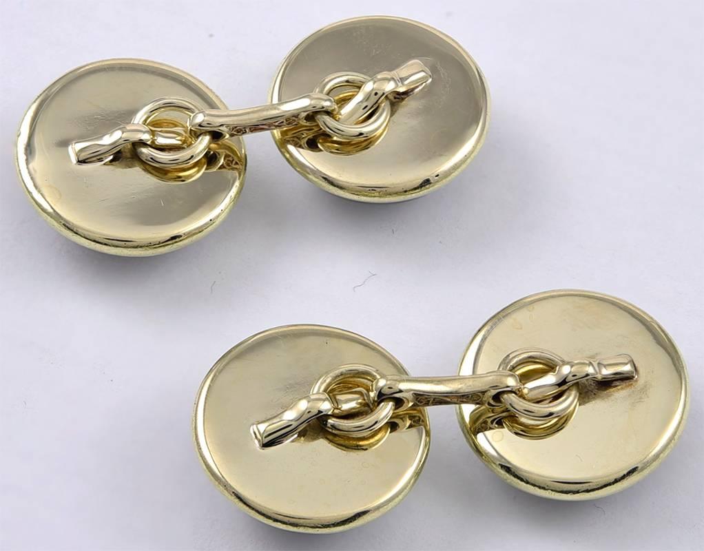 Pair of double-sided cufflinks.  14K yellow gold set with essex crystals depicting German Shepherd dogs.  1/2