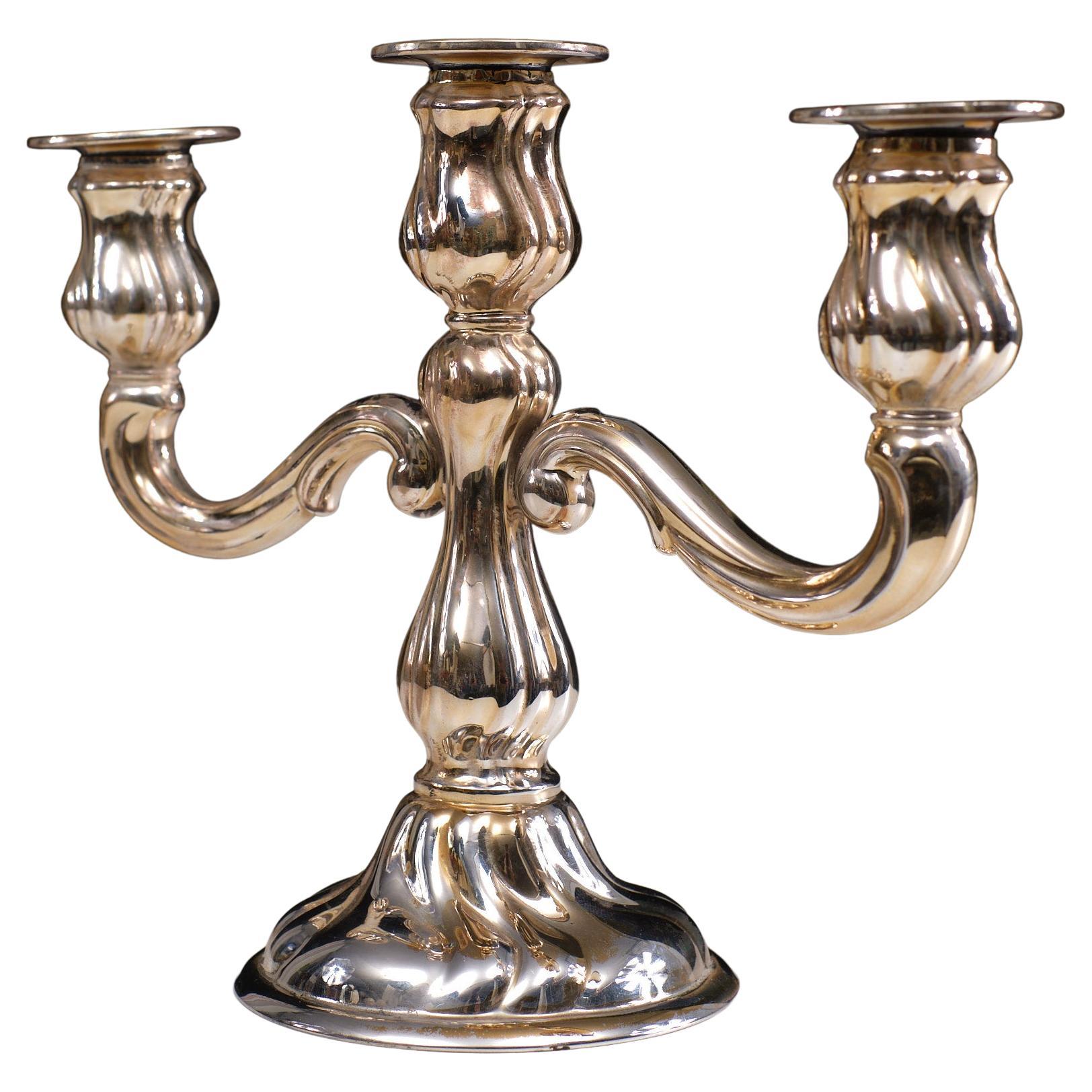 German real silver candelabra. Rococo style. Signed 1920s 3 separated candle wax holders.
needs a polish.