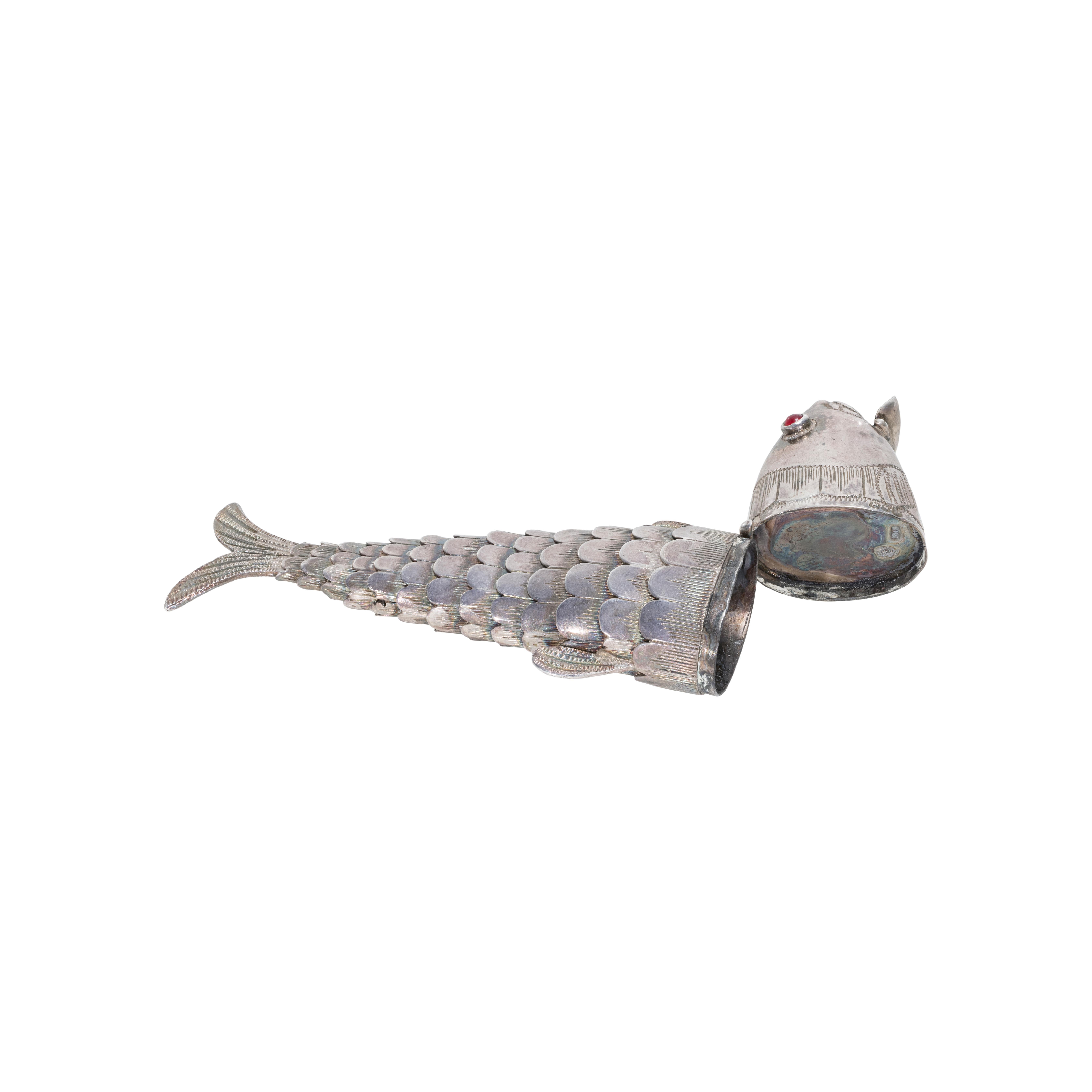 German 800 standard silver articulated fish pill box with hinged head. Ex. Bonhams. Very slinky movable design, intricate detail and jeweled yes. Very unique and ornate.  2.5
