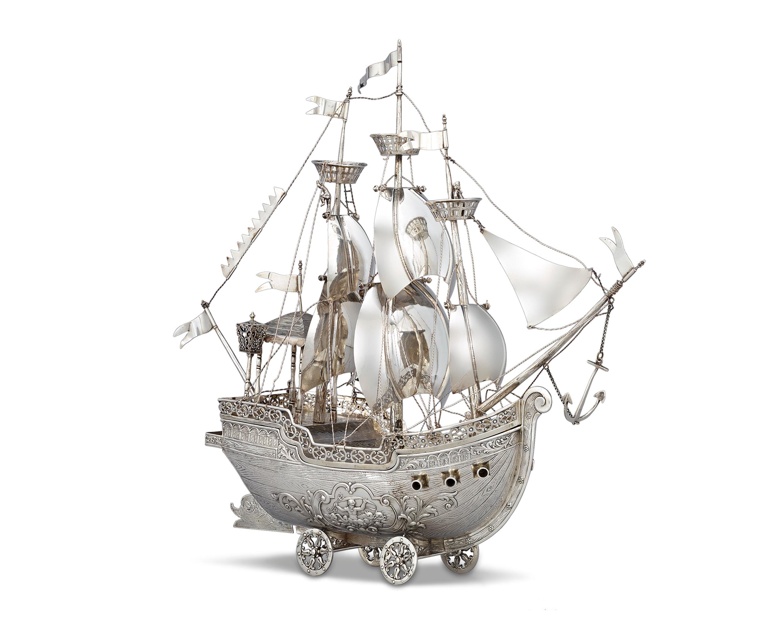 This grand silver nef is a spectacular example of German silverwork from the town of Hanau. Retailed by the import firm of Berthold Mueller, the stunning vessel is covered with incredible detailing and decoration. A true objet d’art, with its
