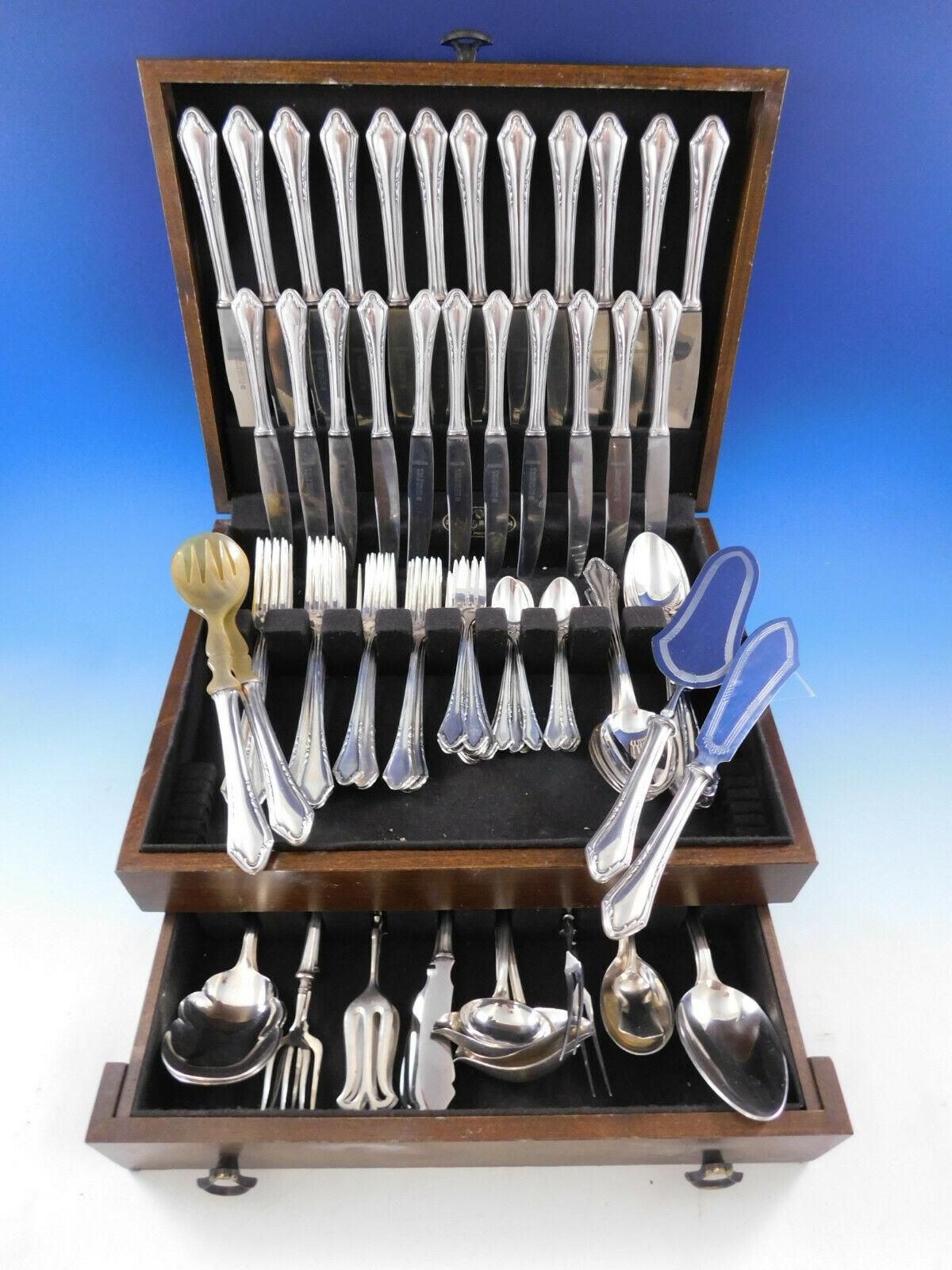 Monumental German silver plated flatware set by Carl Eickhorn Solingen, 102 pieces. This set includes:

12 dinner size knives, 10 1/4