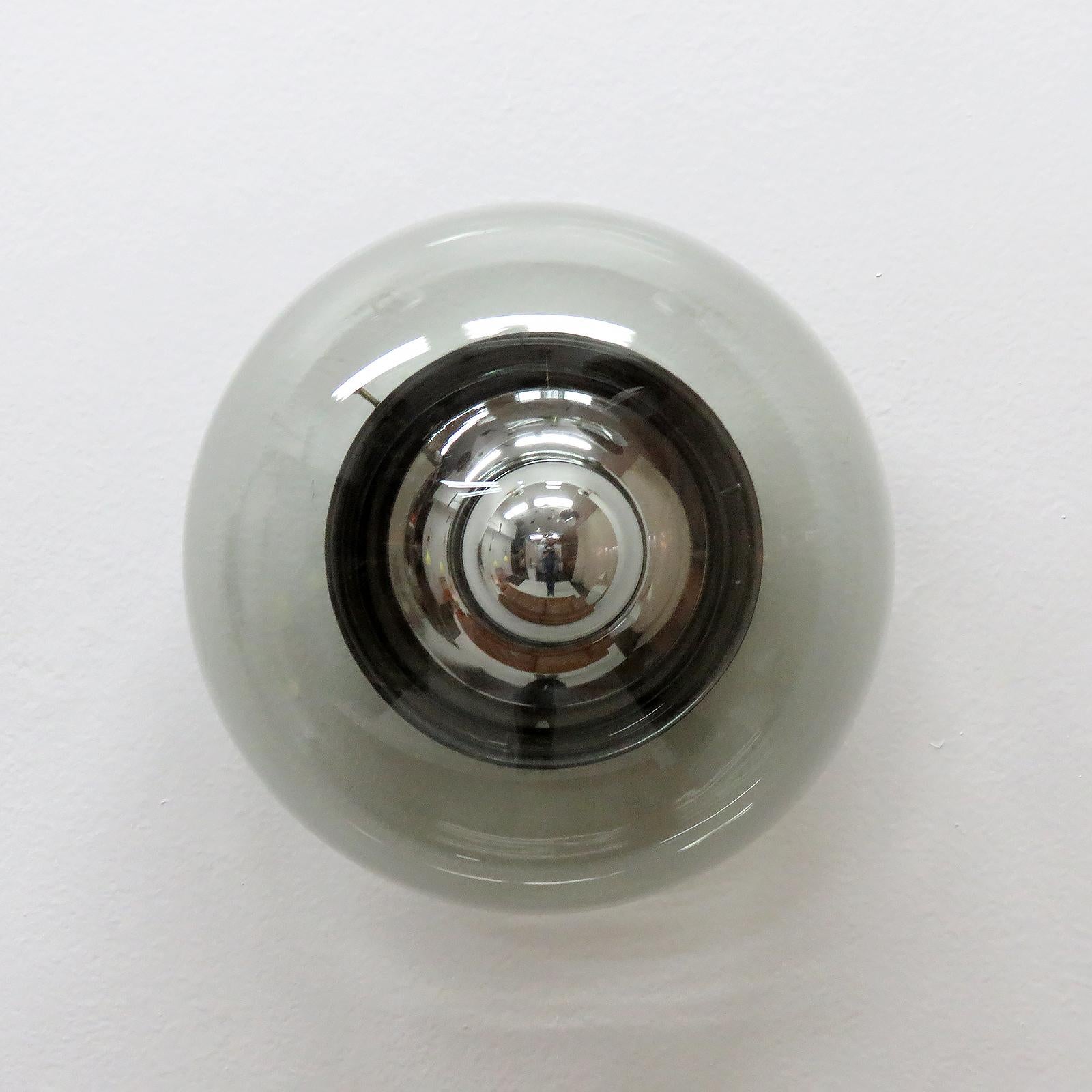 Elegant green-grey hued, dome shaped, smoked glass wall light by Grohe Leuchten Germany, with chrome colored reflector/back plate, the design creates a stunning shadow play, can be used as wall or ceiling lights, wired for US standards, one E27