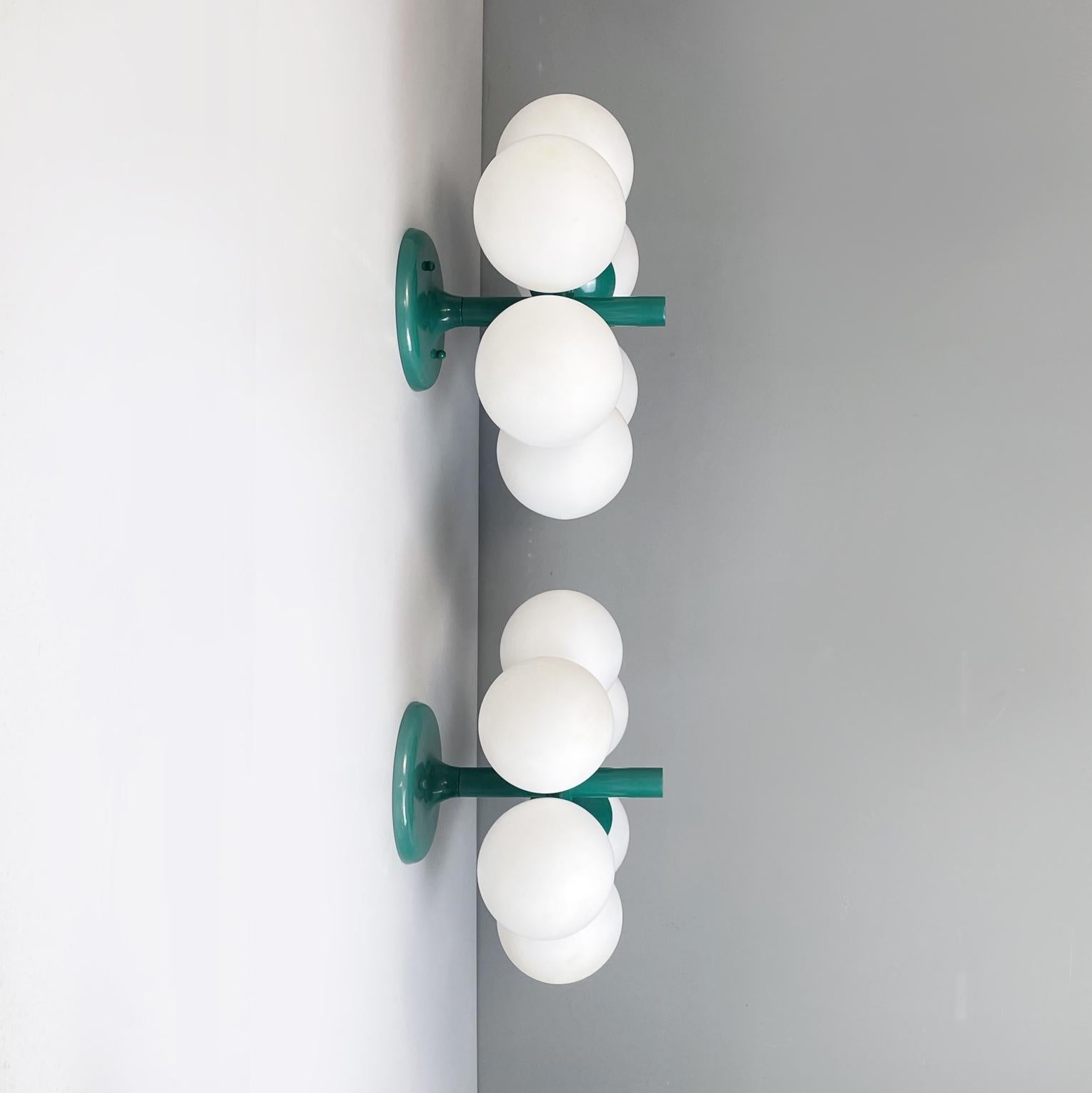 German Space Age mid-century ceiling or wall lamps by Kaiser Leuchten in metal and opal glass, 1960s
Pair of wall lamps or ceiling lamps in two different sizes with six lights. The lamp has 6 opaline glass sphere diffusers. The aquamarine green