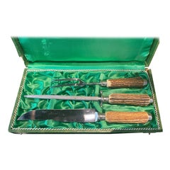 Deutsche Hirschgriff-Schnitzgarnitur im Original-Etui, Mitte 20.