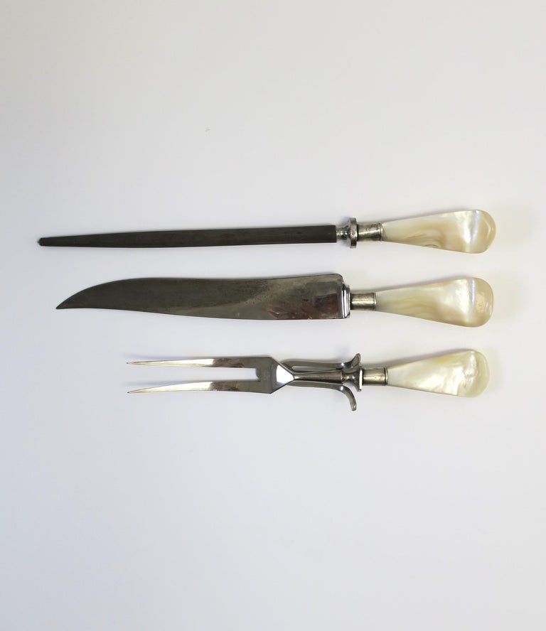 https://a.1stdibscdn.com/german-stainless-steel-knife-fork-carving-set-mother-of-pearl-handles-set-of-3-for-sale-picture-3/f_13142/f_311958121667827212154/IMG_7395_master.JPG?width=768