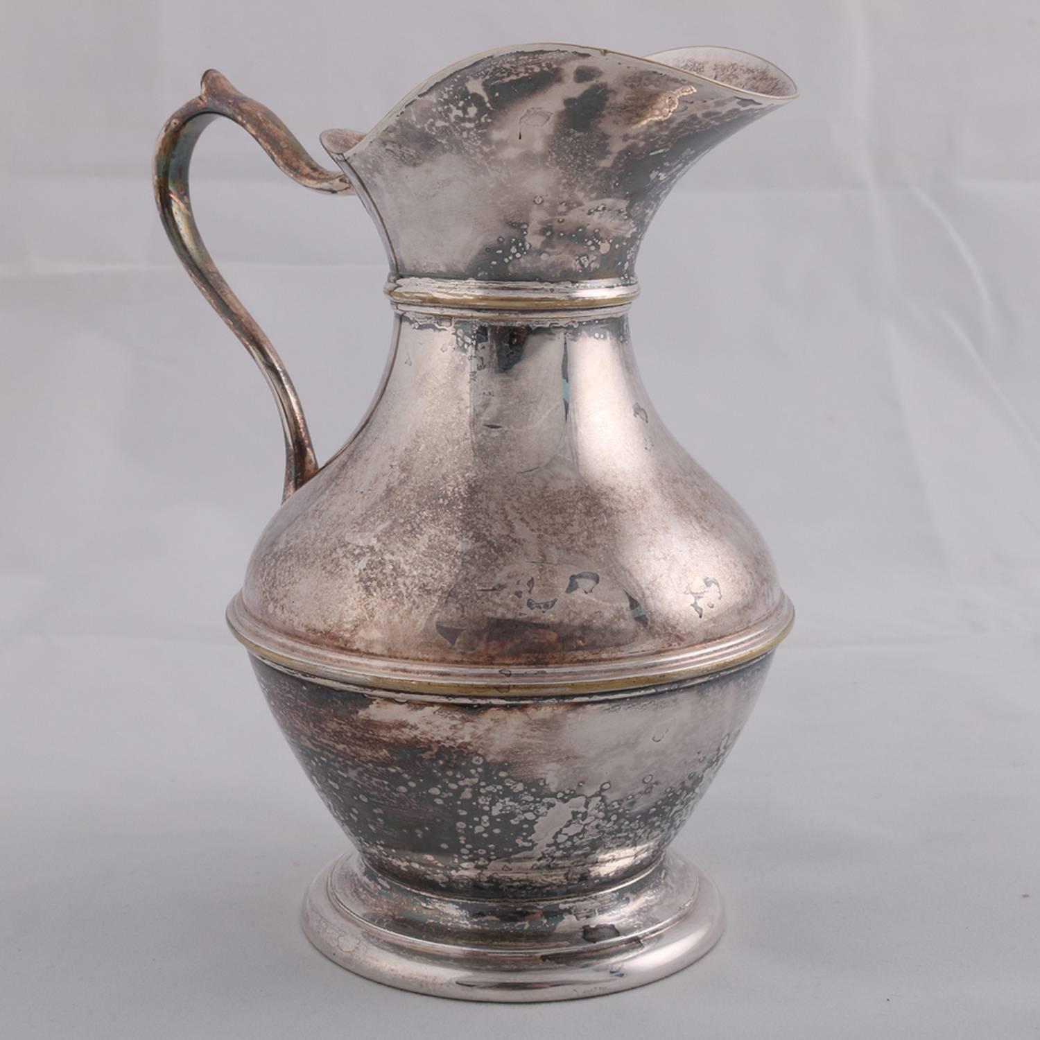 German sterling silver hallmarked Georgian style pitcher features hourglass form with scroll handle, touch marks on base include rampant lion, possibly Darmstadt, 9.4 toz, 19th century
 

Measures: 6.5