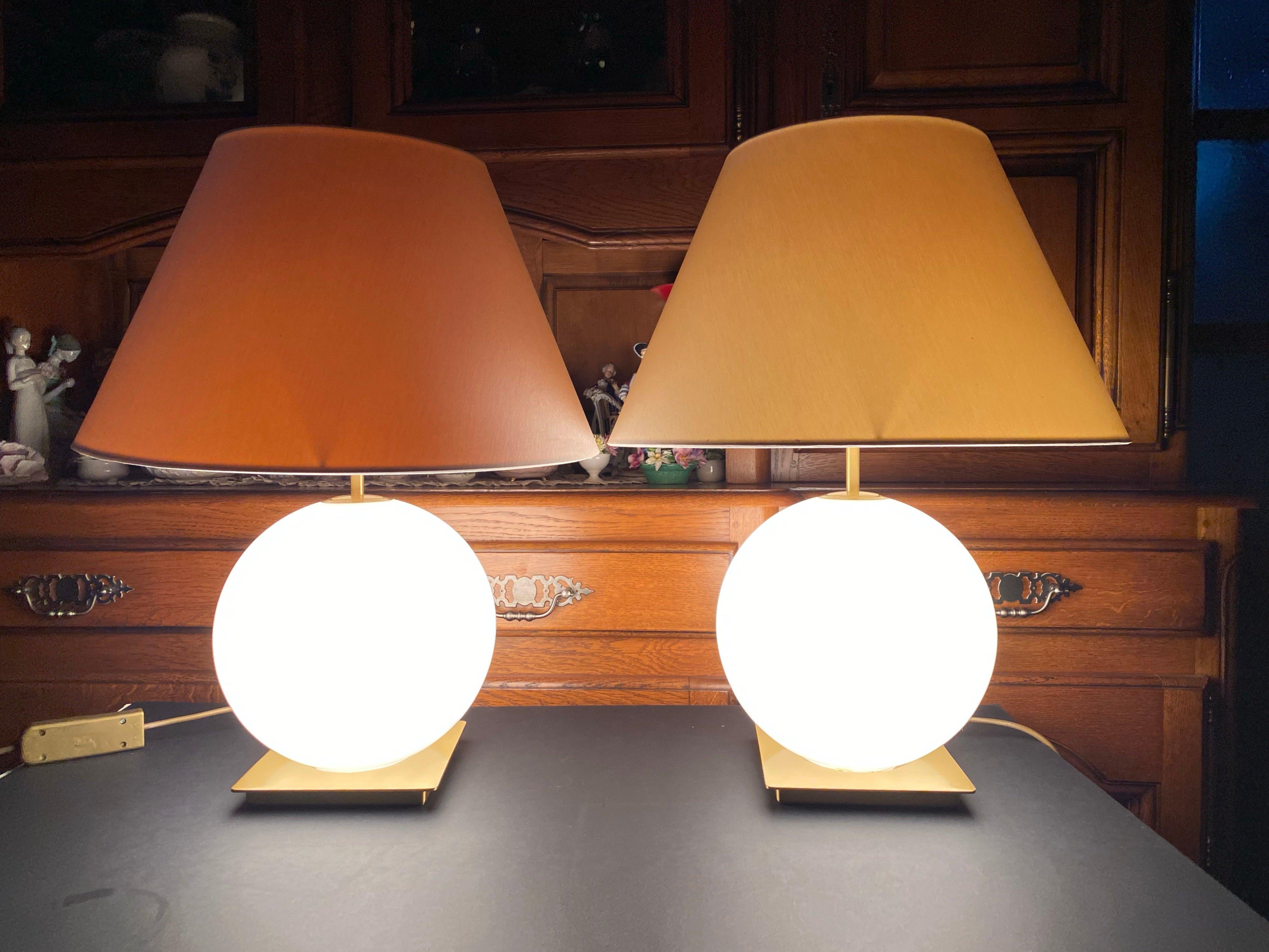 A pair of very elegant table lamps from famous German manufacturer Holtkötter. 

Holtkötter has been engineering and manufacturing product in Germany for over 50 years and assembling product in the U.S. for about 30 years. 

The spherical body is