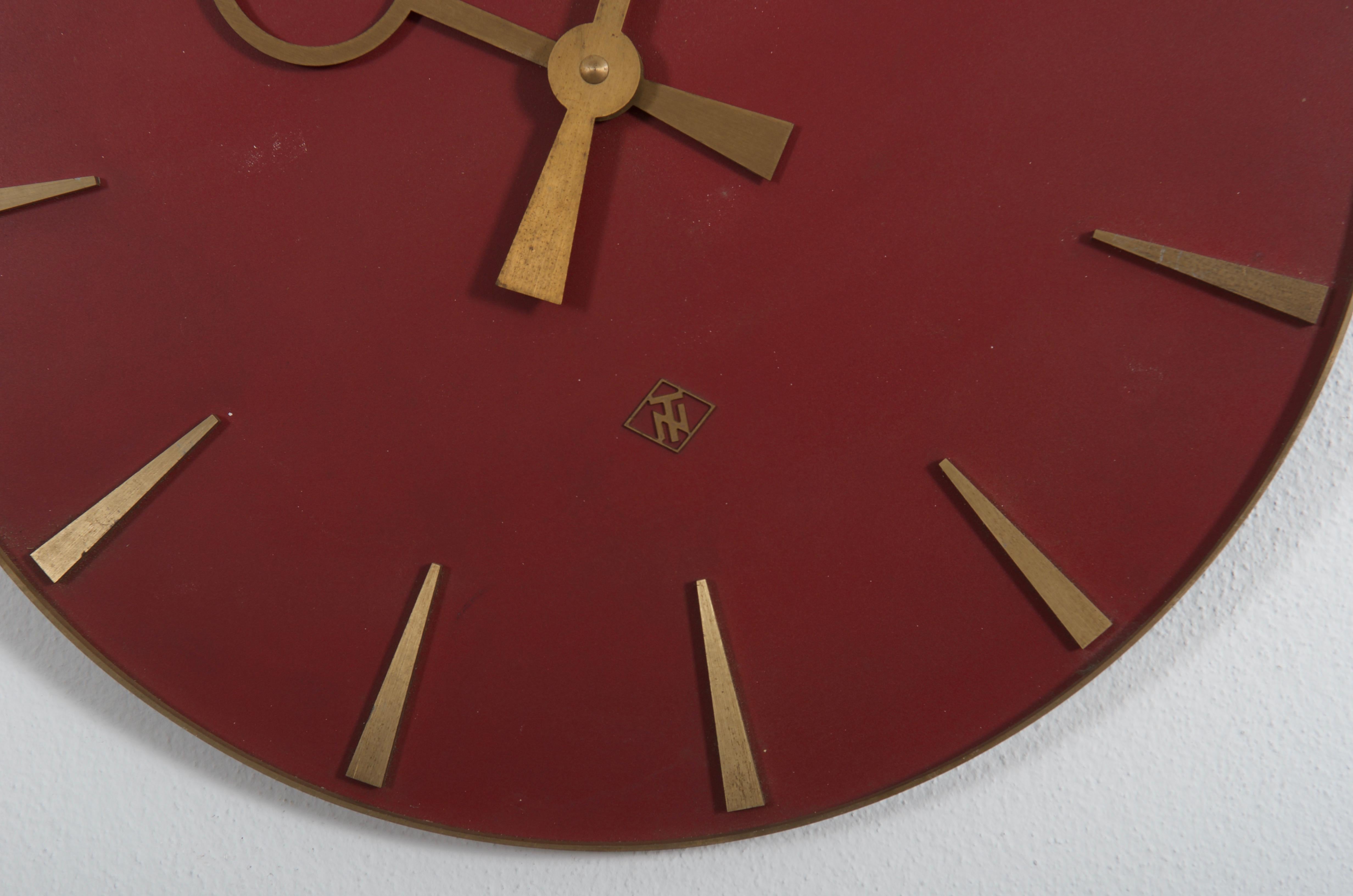 Brass frame and brass hands made by TN Telenorma in the late 1960s.
Formerly an office or factory slave clock, it is now fitted with a modern quartz movement with an AAA battery.
  