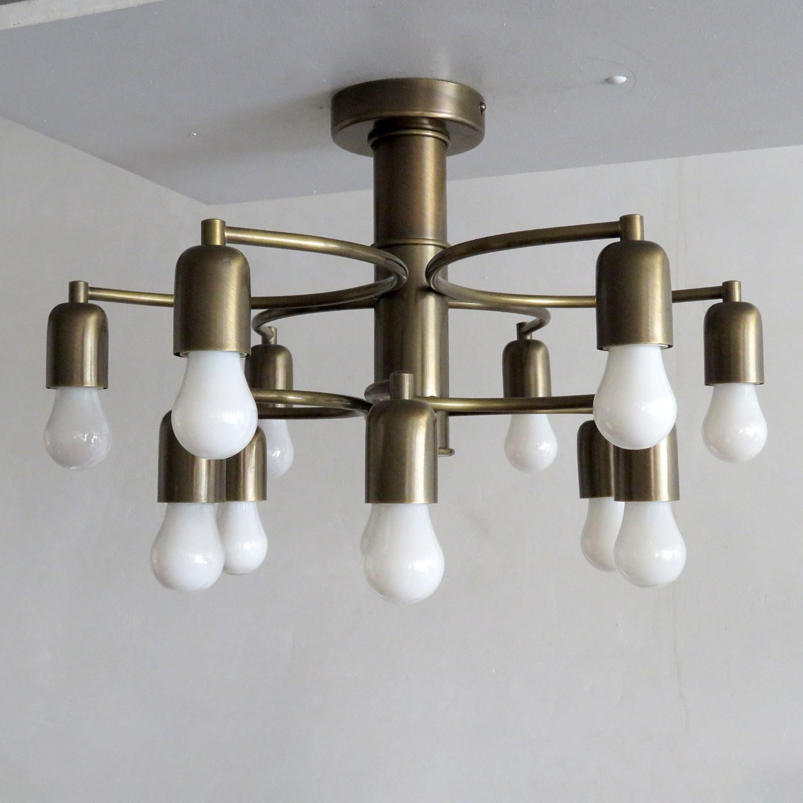 Stunning brushed bronze twelve-light flush mount ceiling light by Honsel, Germany with two tiers of semi circular arms, can be used as wall sconce as well, wired for US standards, twelve E27 sockets, max. wattage 25w each or LED equivalent, bulbs