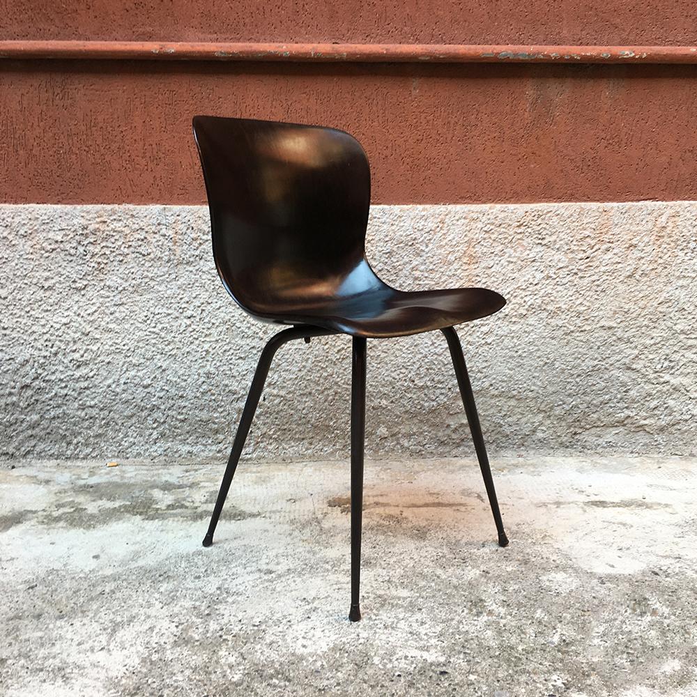 German chair with metal legs and unique curved wood shell.
Made by Pagholz in the 1960s.
Perfect condition since entirely restored
Measures: 41 x 43 x 77 H cm.