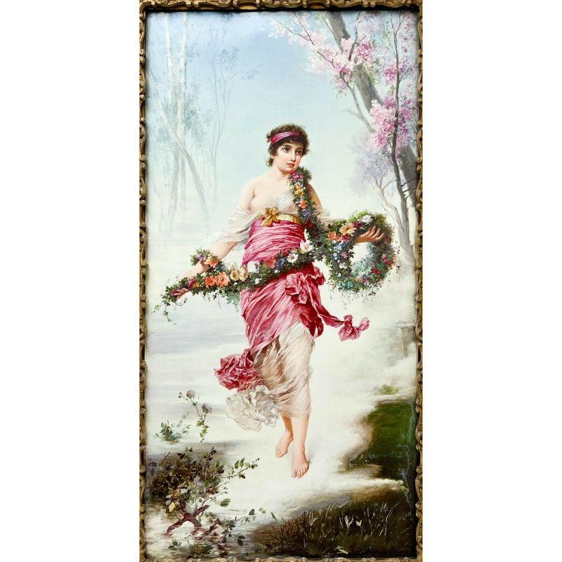 German Vienna Hand Painted Porcelain Plaque Flora in Period Viennese Frame

Early 20th century German Vienna hand painted porcelain plaque. Plaque depicts a woman holding a garland of flowers in a forest with melting snow at her feet. Artist