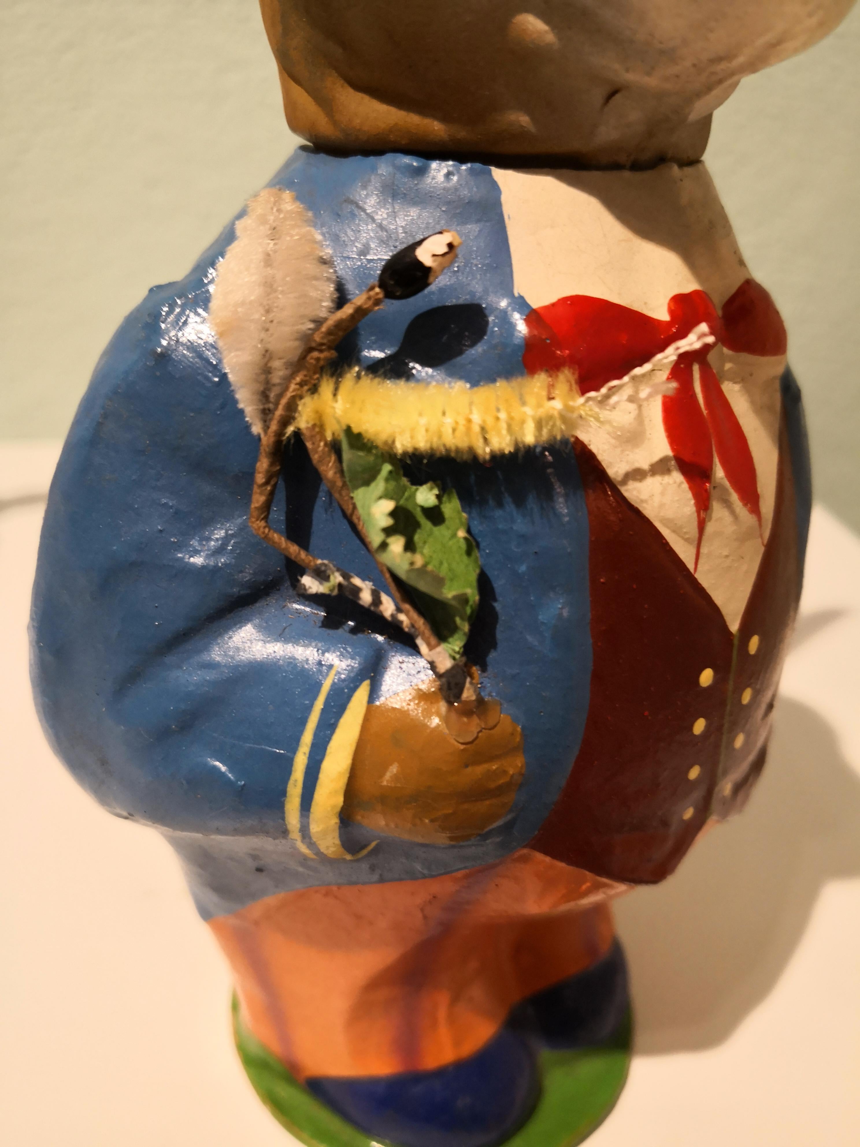 Vintage Easter bunny candy box. Easter bunny figure made of papier mache from the 50th. Hand painted and decorated with beautiful Easter decoration. The head can be put off to fill with sweets.