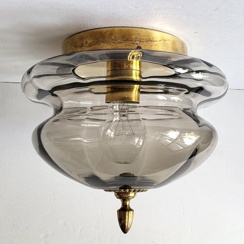 Beautiful vintage struktur glass flush mount with brass fitting.
Germany, 1960s.

