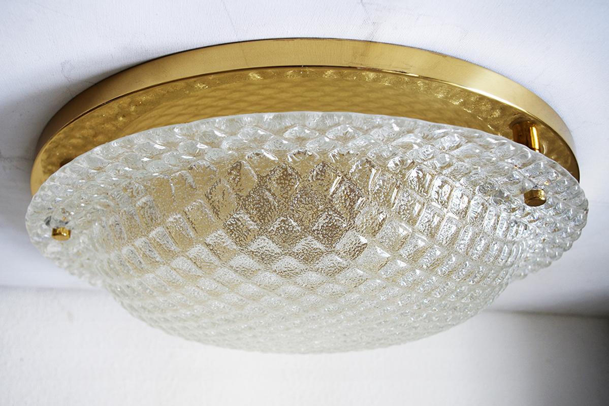Beautiful ice glass flush mount with brass fitting.
Germany, 1960s.

  