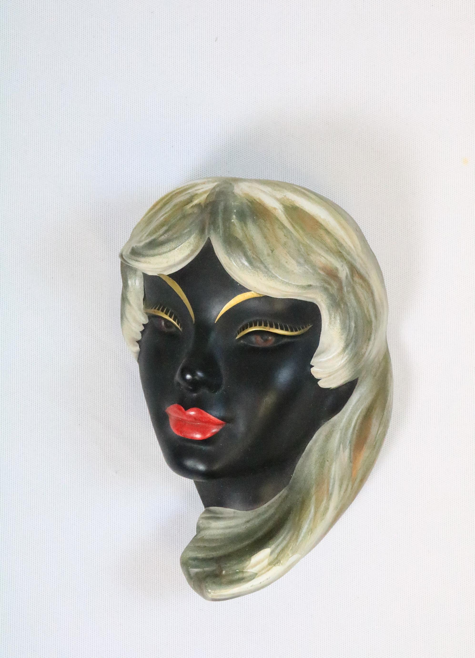Rare, very well-preserved wall mask from Germany.

Original 1959.
From Goebel.
Made of 