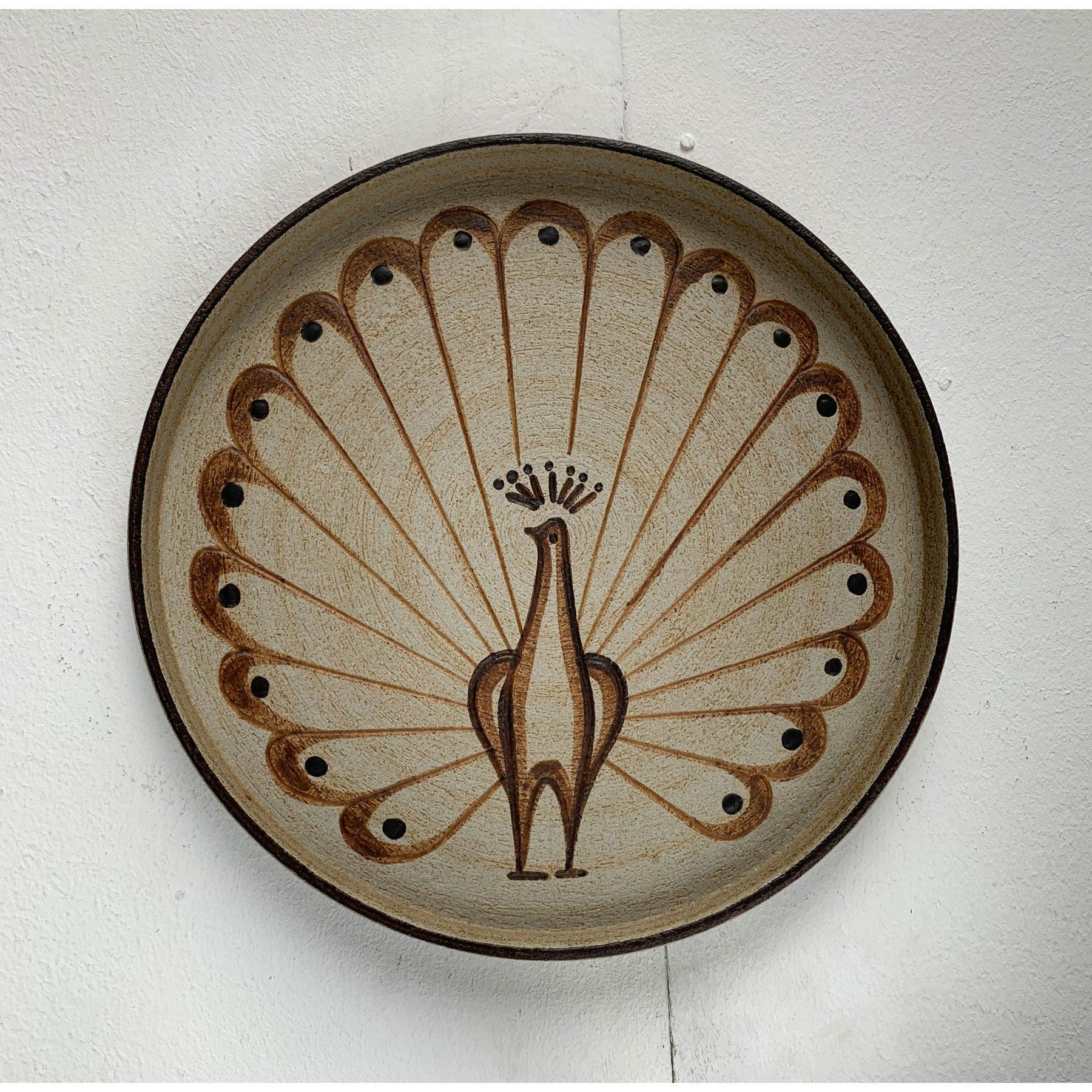 German Wall Plate or Bowl with Peacock Motif from Sgrafo Modern, 1960s, in Very Good conditions. Designed 1960 to 1969 This piece has an attribution mark.

Additional information:
Materials: Ceramic
Style: Mid-Century Modern
Country of Origin: