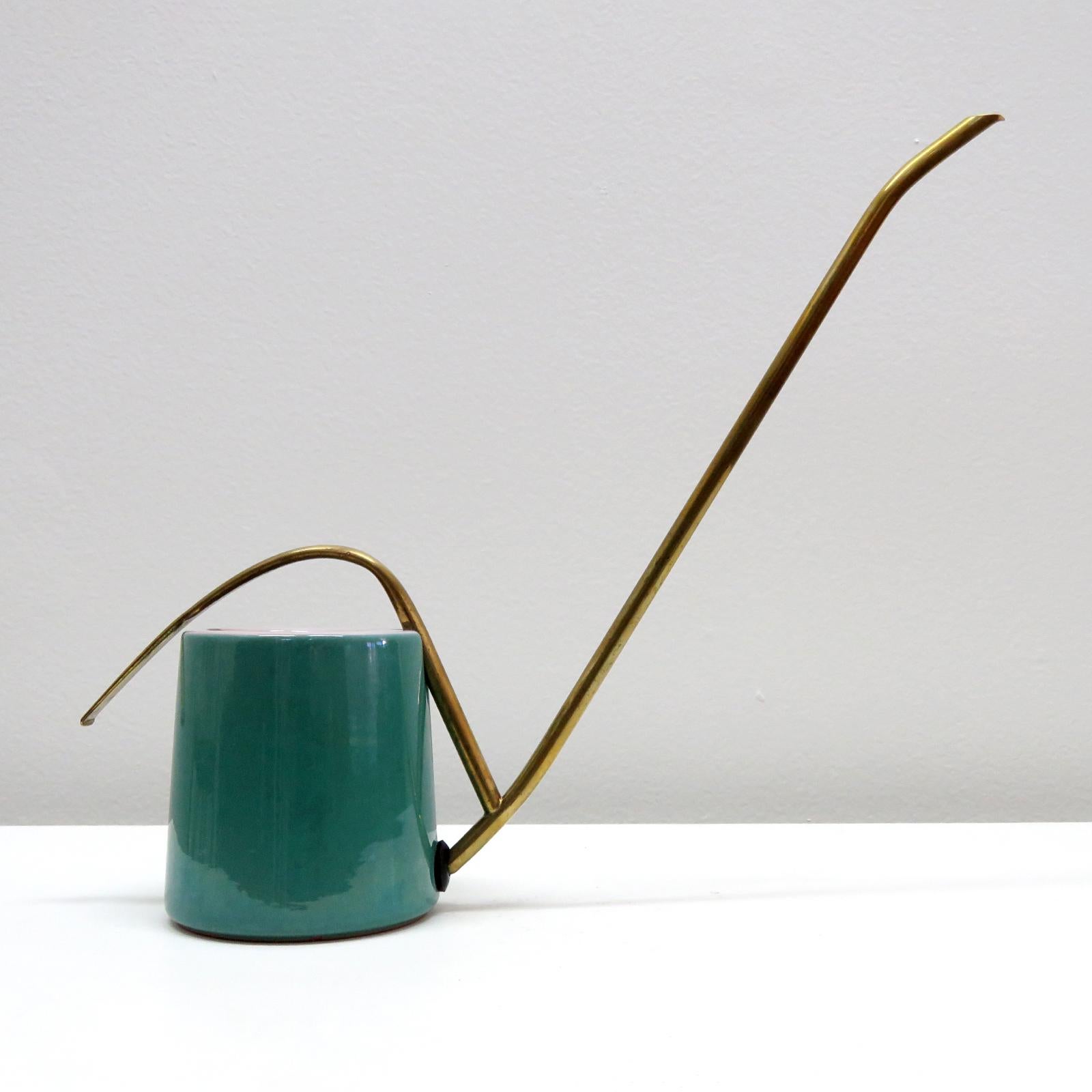 Sculptural German cactus watering can by Fritz Dienes for Hessische Majolika, Germany, 1953, with dual color glazed ceramic body and sculptural brass handle and spout, great lines, great original condition, marked.