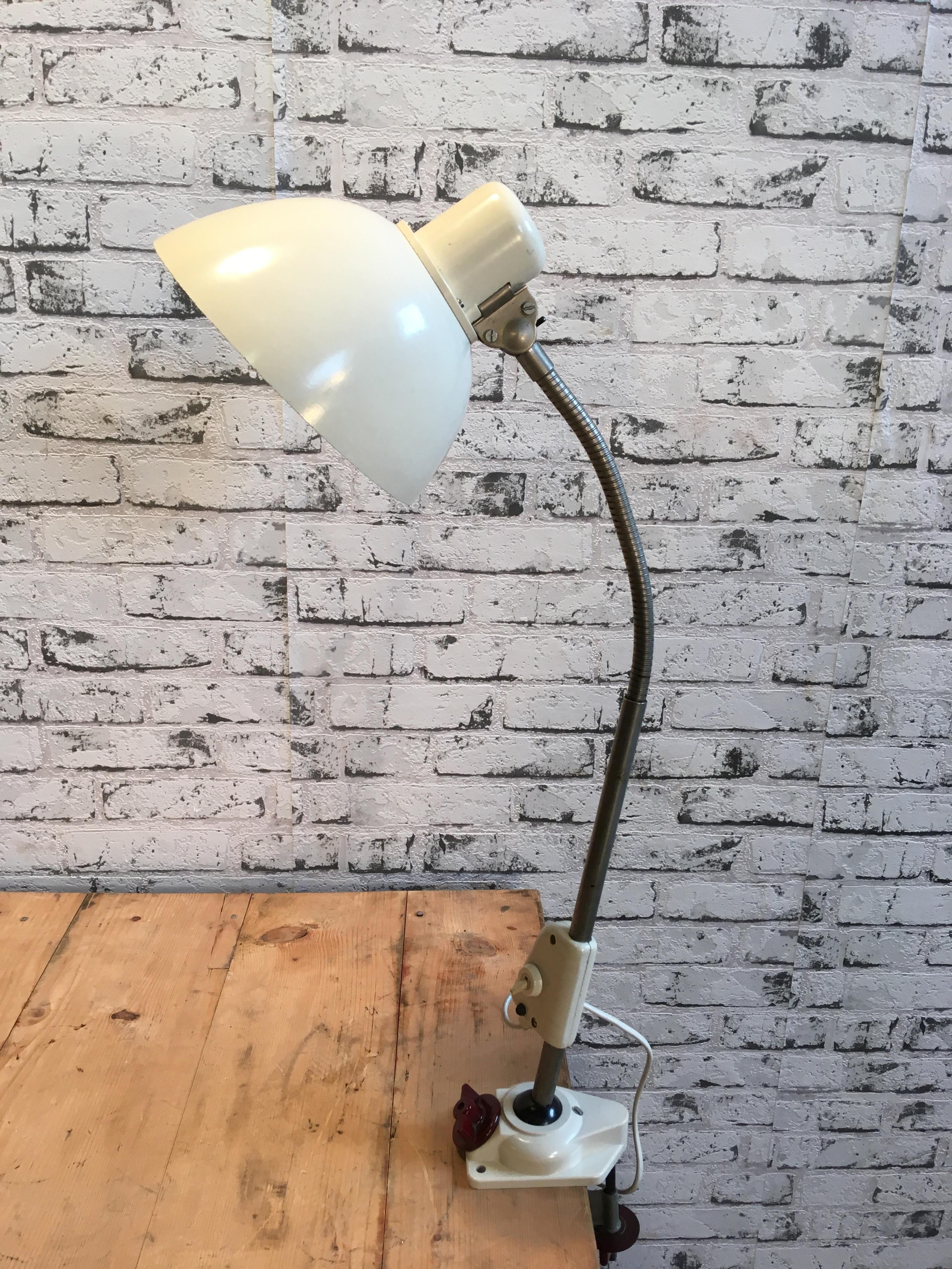 Old German bakelite flexible industrial table lamp. Made by Reif Dresden, 1950s.
