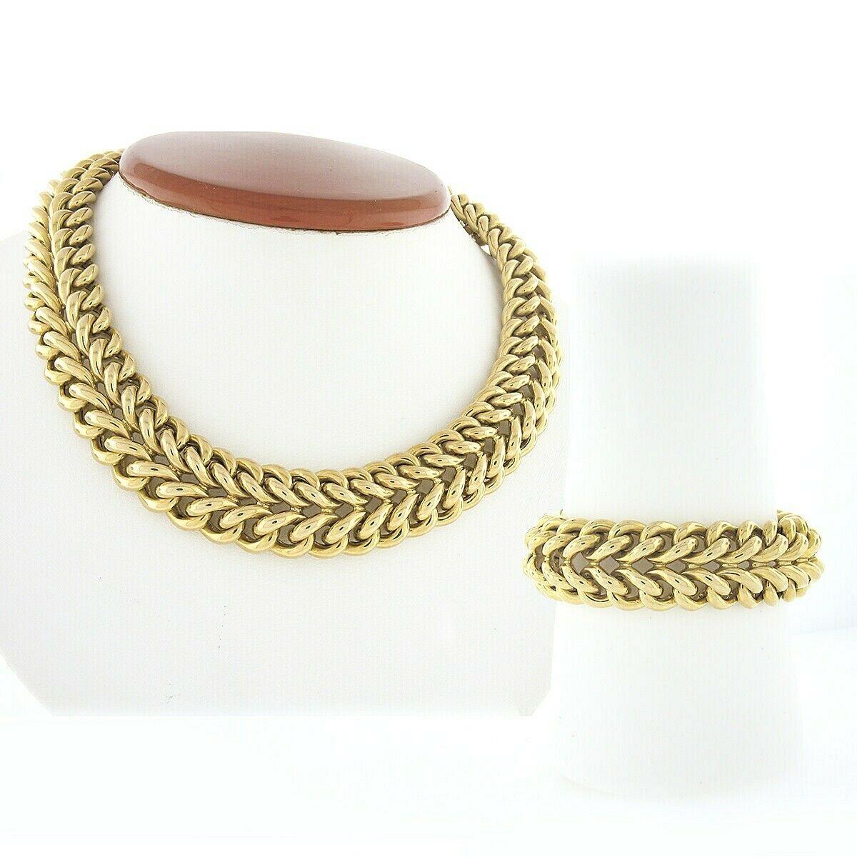 This beautiful statement necklace and bracelet matching set was crafted in Germany from solid 18k yellow gold. This solid and very well made set features double row curb link throughout with a wonderful high-polished finish for a super attractive