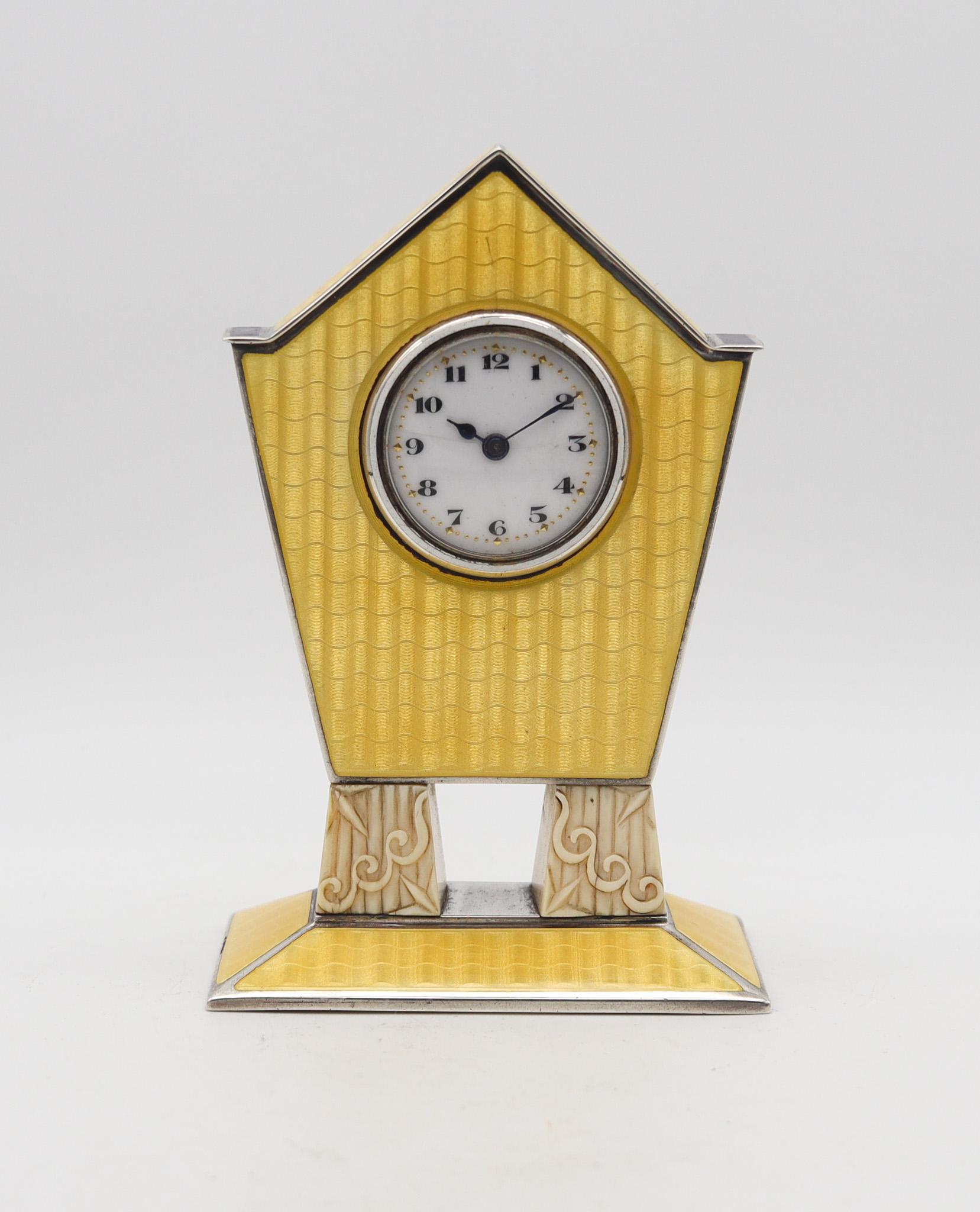 An art deco miniature boudoir desk clock.

Extremely beautiful miniature desk clock, made in Pforzheim Germany during the art deco period, back in the 1920. The craftsmanship of this boudoir clock is exceptional, crafted with gorgeous geometric deco