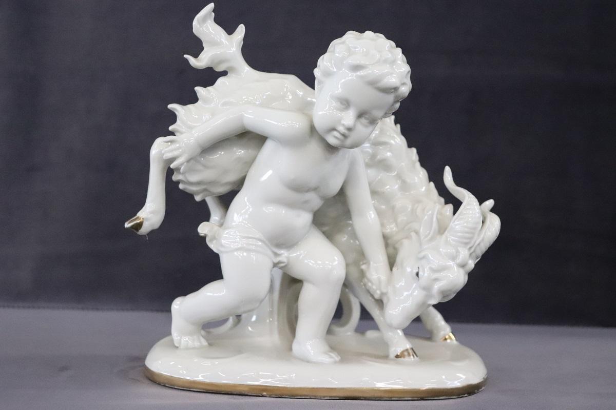 Beautiful porcelain figurines putto with goat of the Germany WKC Weiss, Kühnert & Co Graefenthal manufacture, perfect condition. Brand present under the base.