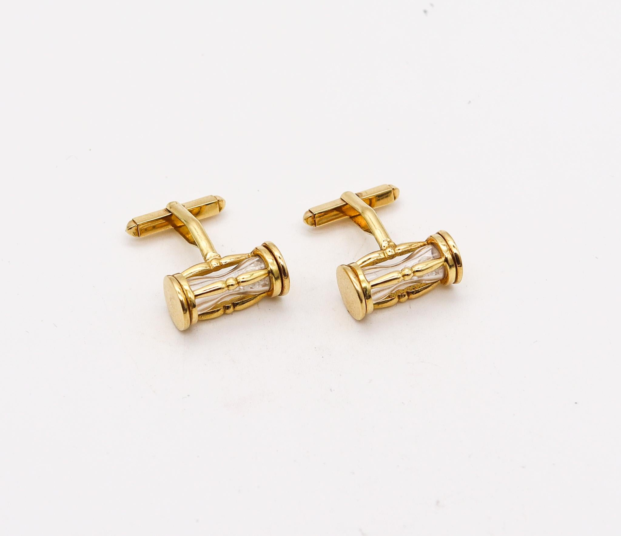 Sand clocks cufflinks designed in Germany.

Very unusual and beautiful pair of men's cufflinks, created in Germany back in the 1980. These playful pair has been crafted in the shape of sand clocks in solid yellow gold of 18 karats with high polished