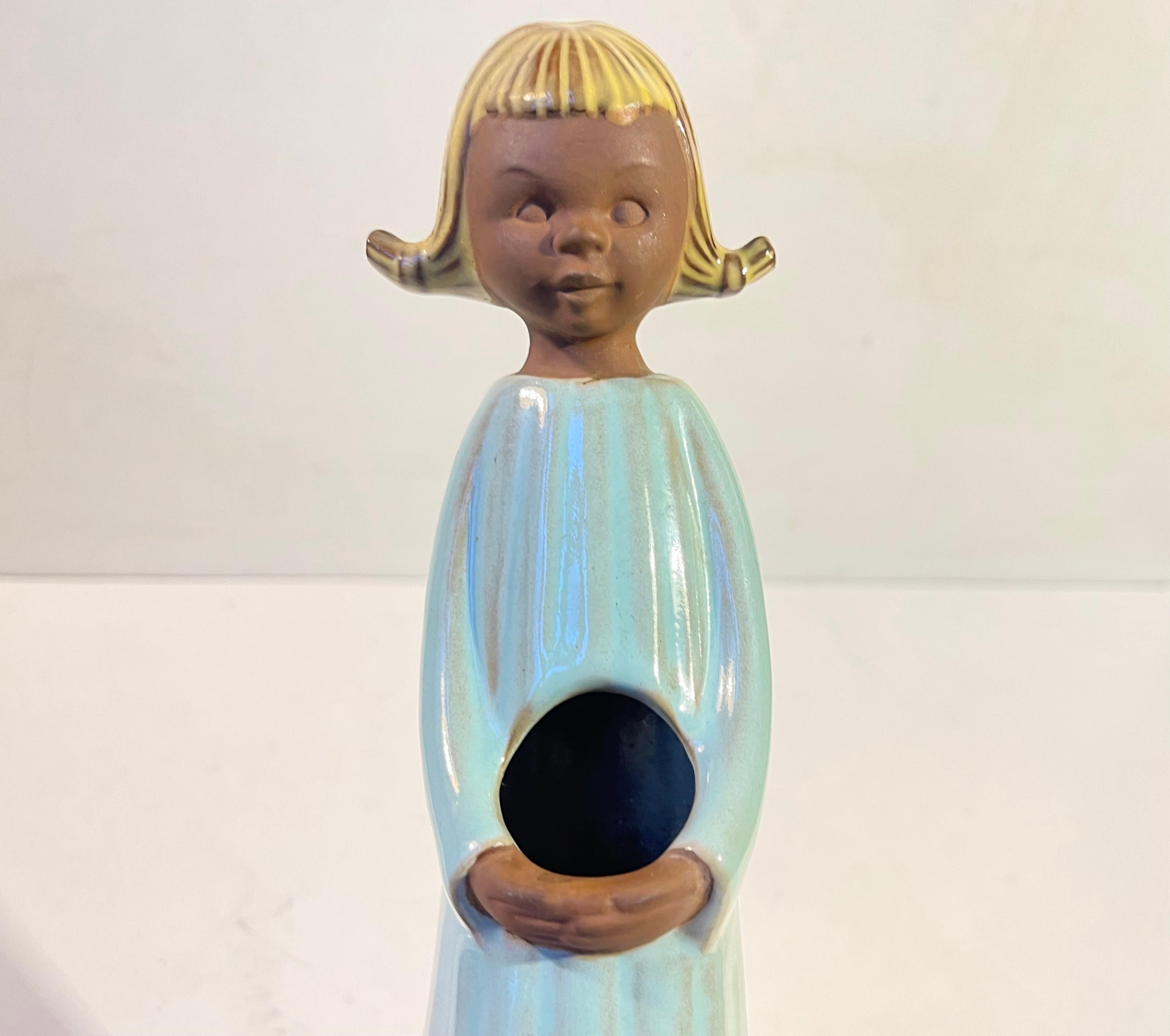 German Figural glazed ceramic vase number VF 22 from 1968. Made by. W. Goebel in 1968. This is the tall version measuring 24 cm in Height and with a diameter of 7 cm (base).