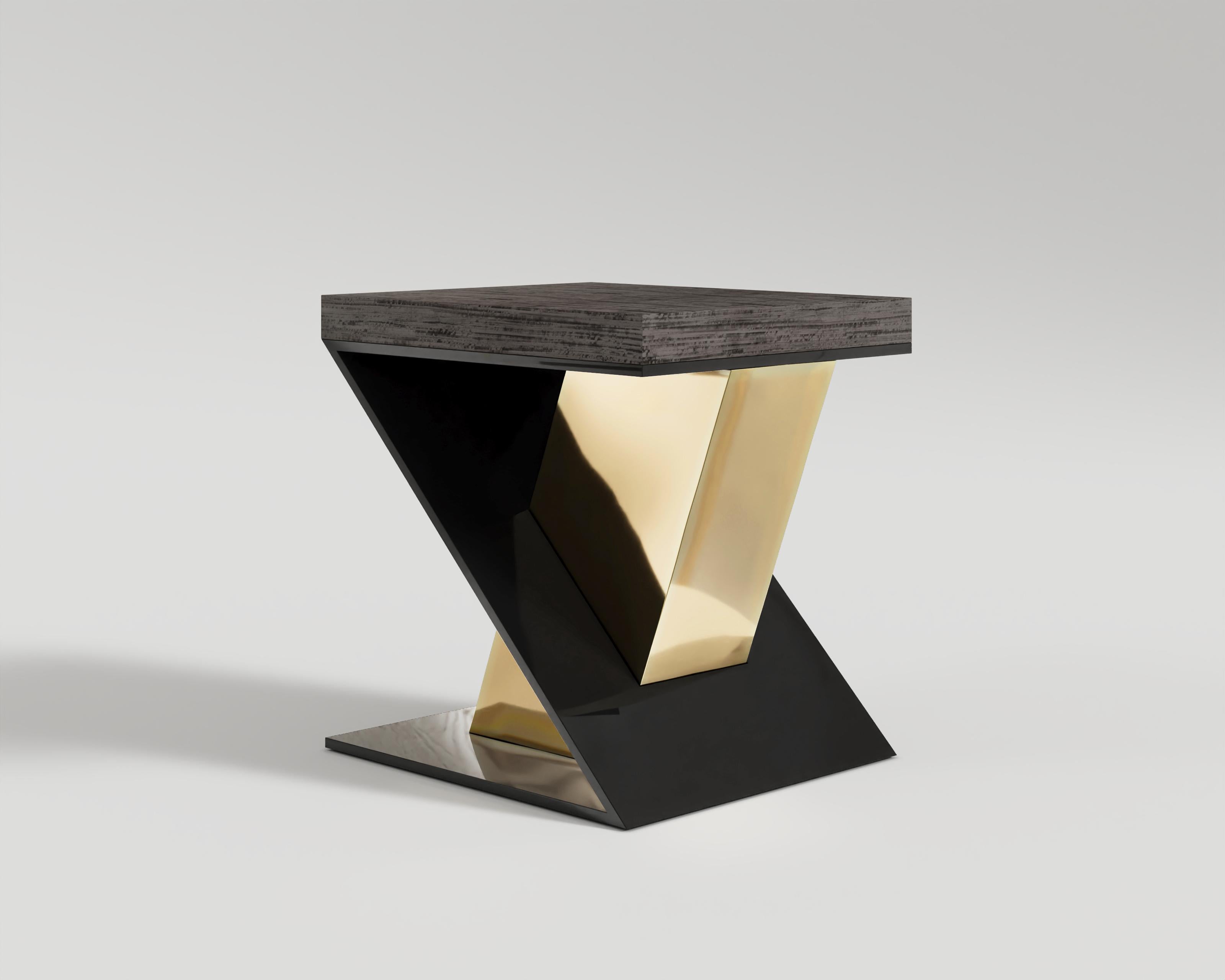 Gero Side Table
Gero Side Table no doubt a dark voice of fashion design. The strong black lacquer serves as the base, and the polished bronze that crosses it reveals a contrasting texture. It is a kind of a junction where materials participate and