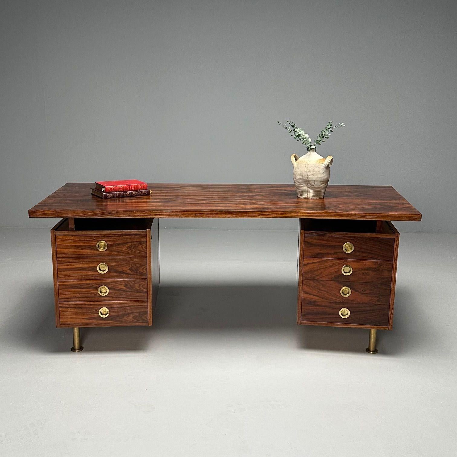 Geroge Coslin, Arredamenti, Italian Mid-Century Modern, Writing Desk, Rosewood

Modern Italian writing desk designed by Geroge Coslin for 3V Arredamenti, Padova circa 1960s. This example features an organic form boomerang shaped top that sits on two