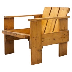 Gerrit Rietveld Silla moderna de mediados de siglo con cajón de madera, hacia 1950
