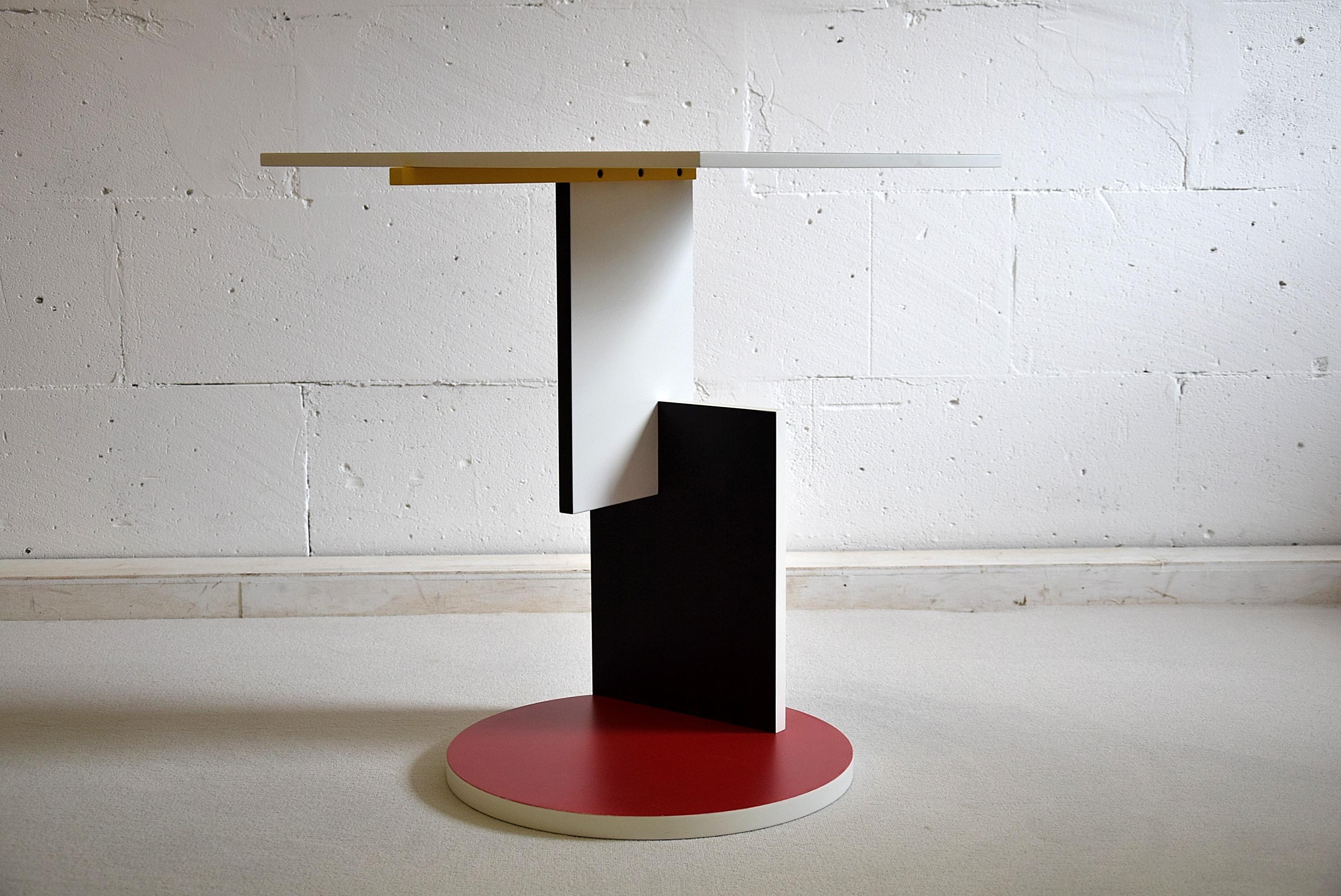 Schroeder 1 side table by Gerrit Rietveld for Cassina. This beautiful asymmetrical creation by architect and designer Gerrit Rietveld was especially designed for the Schroeder house in Utrecht the Netherlands with the geometric cubist form of De