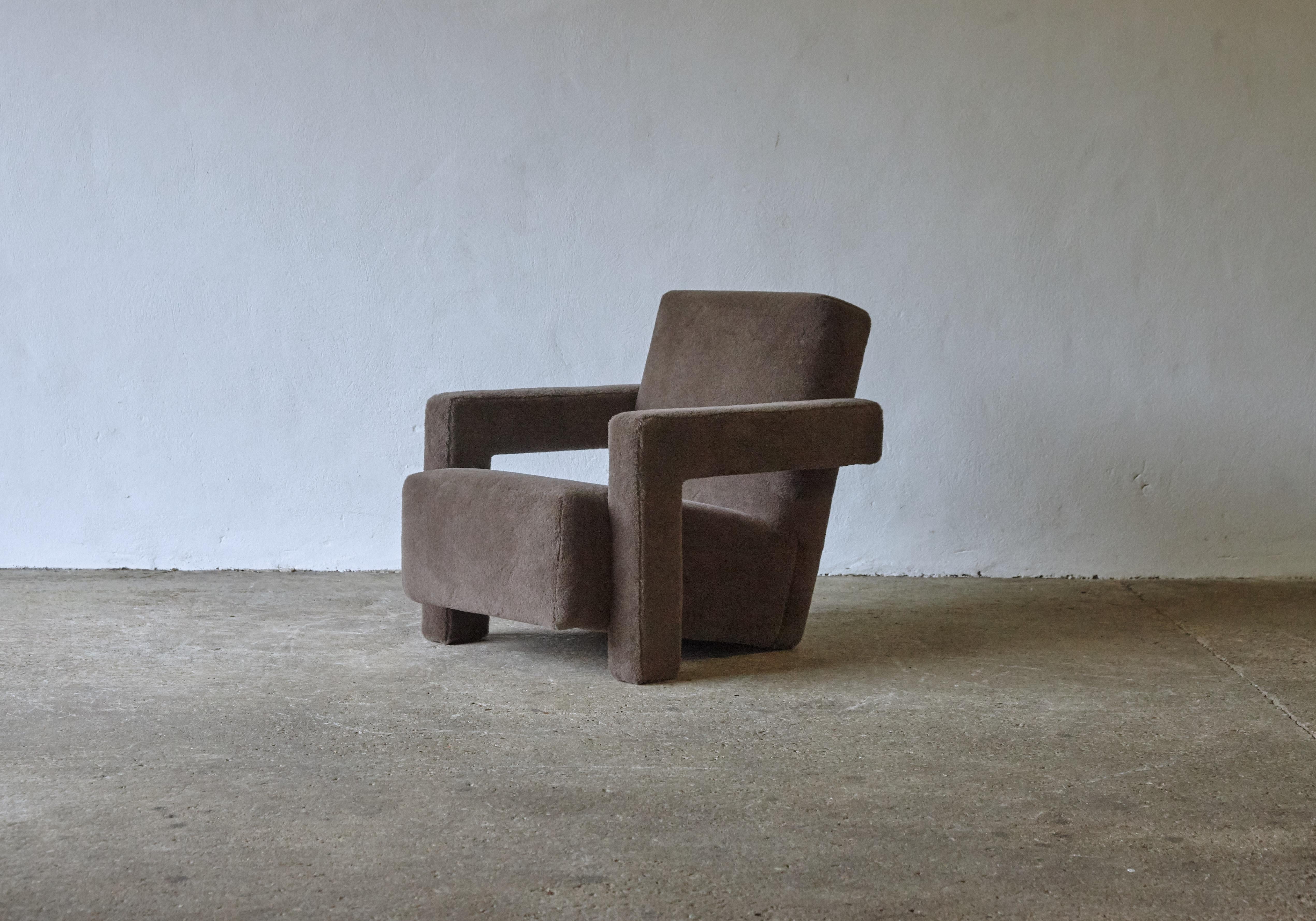 A Gerrit Rietveld Utrecht armchair, produced by Cassina, and newly upholstered in a brown / grey thick, soft, luxurious 100% alpaca pile fabric. Cassina label to the underneath. Fast shipping worldwide.

UK customers please note: displayed prices