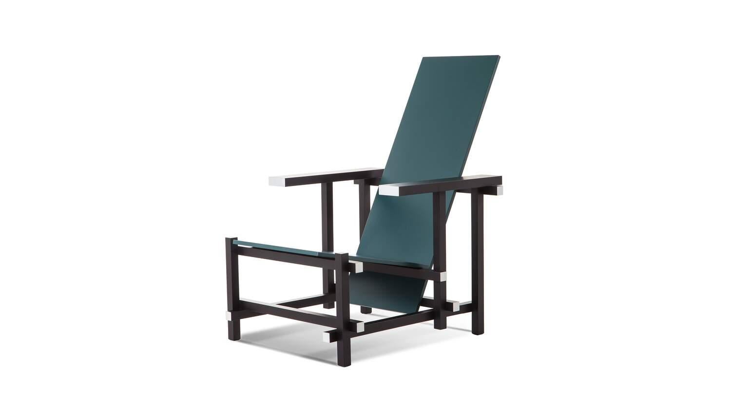 Chair designed by Gerrit Rietveld in 1920. Relaunched in 2015.
Manufactured by Cassina in Italy.

One of the versions of the iconic model dated 1918. The structure is in black-stained beechwood with white contrasting parts. Seat and back in green
