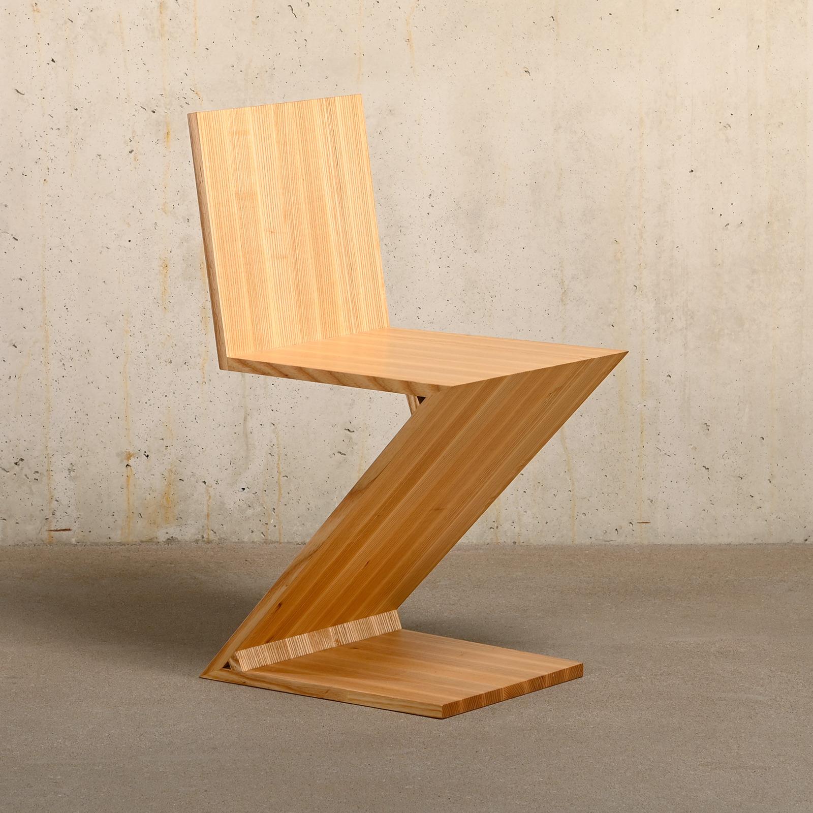 This Zig Zag Chair was manufactured by a local craftsman after the design of Gerrit Rietveld. Solid ash wood finished in matte lacquer in very good and sturdy condition.