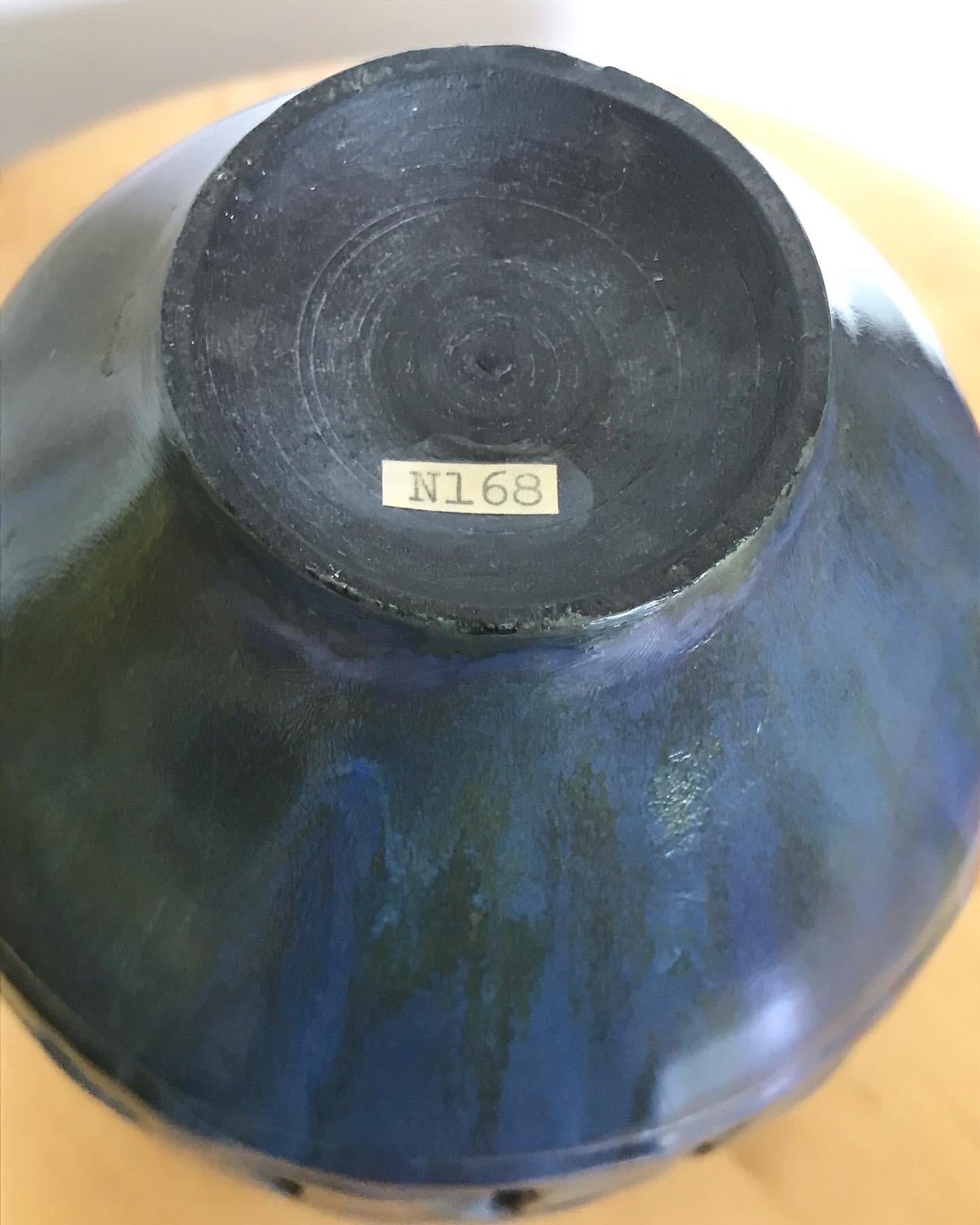 A rare piece with paper I.D. number.
In the late 1940's, Otto made some utilitarian ceramics that were unsigned for a short lived company called the Guild.
A typical wheel thrown form by Gertrud.
Glazed by Otto with fissure accents and geometric