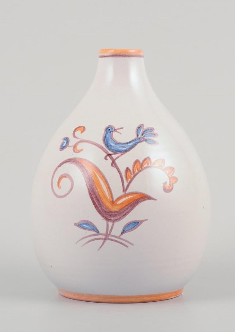 Gertrud Kudielka for Hjort, Bornholm.
Unique ceramic vase. Motif of bird on branch.
White glazed hand-painted stoneware.
Mid 1900s.
Marked.
In perfect condition.
Dimensions: Height 13.0 cm. x Diameter 9.0 cm.