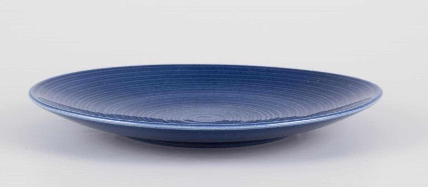 Pre-owned goods are exempt from import duties for U.S. customers. 
Therefore, no import tariffs will be applicable to your purchase.

Gertrud Lönegren for Rörstrand, Sweden.
Set of twelve 