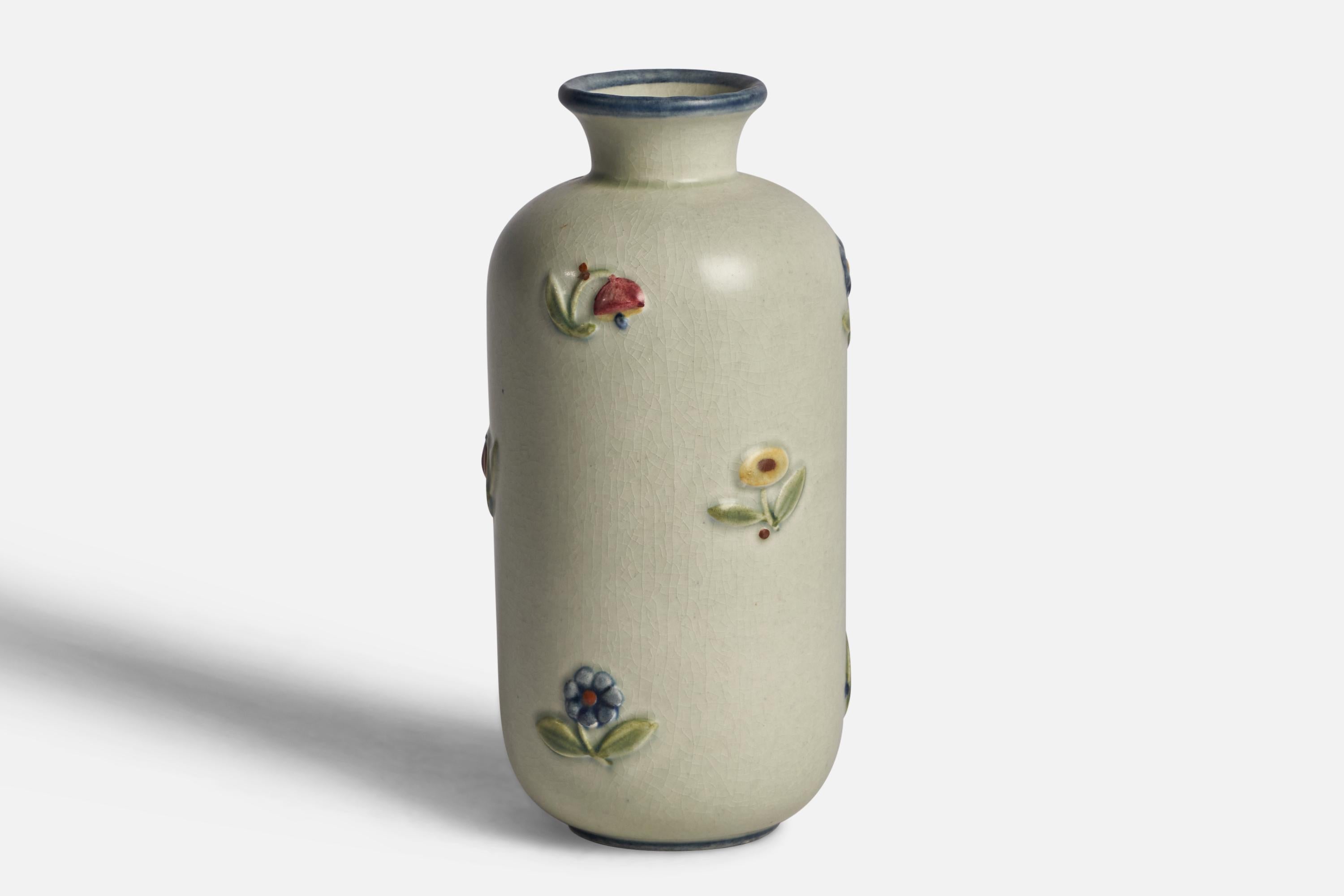 A handpainted white red and green stoneware vase designed by Getrud Lönegren, Sweden and produced by Rörstrand, 1940s.
