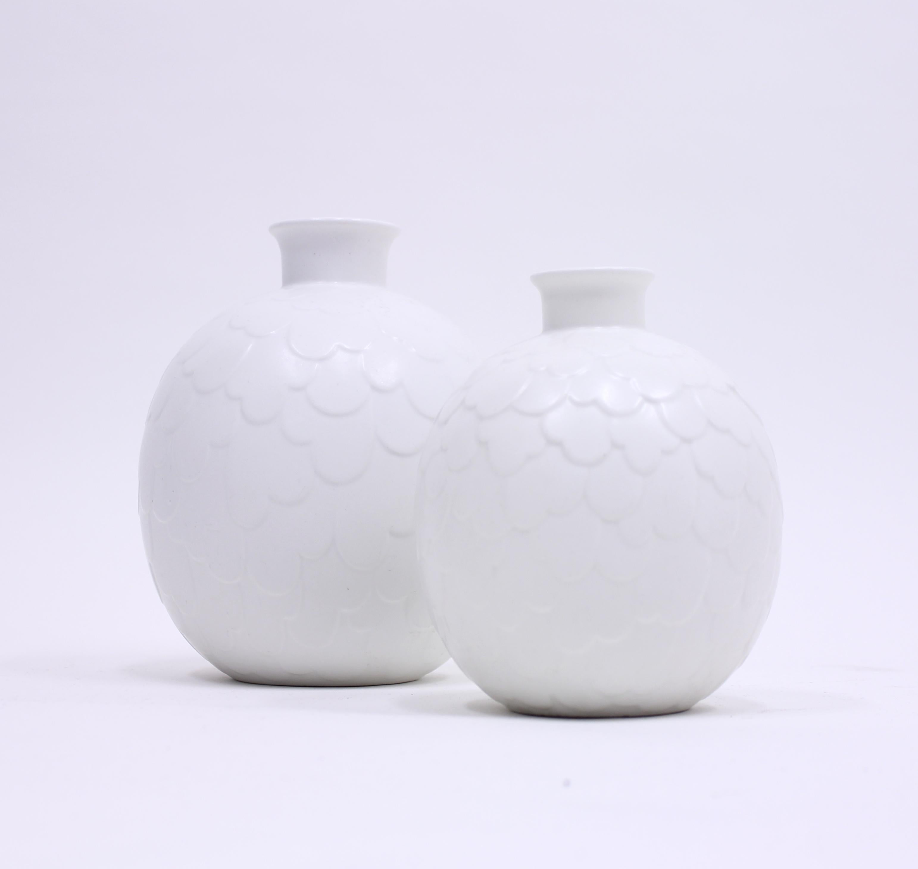 Rare set of 2 vases from the Capri series designed by Gertrud Lönegren for Swedish manufacturer Rörstrand in the 1950s. The vases are in two different sizes. The smallest are 17 cm high and have a diameter of 14 cm. The larger one is 22 cm high and